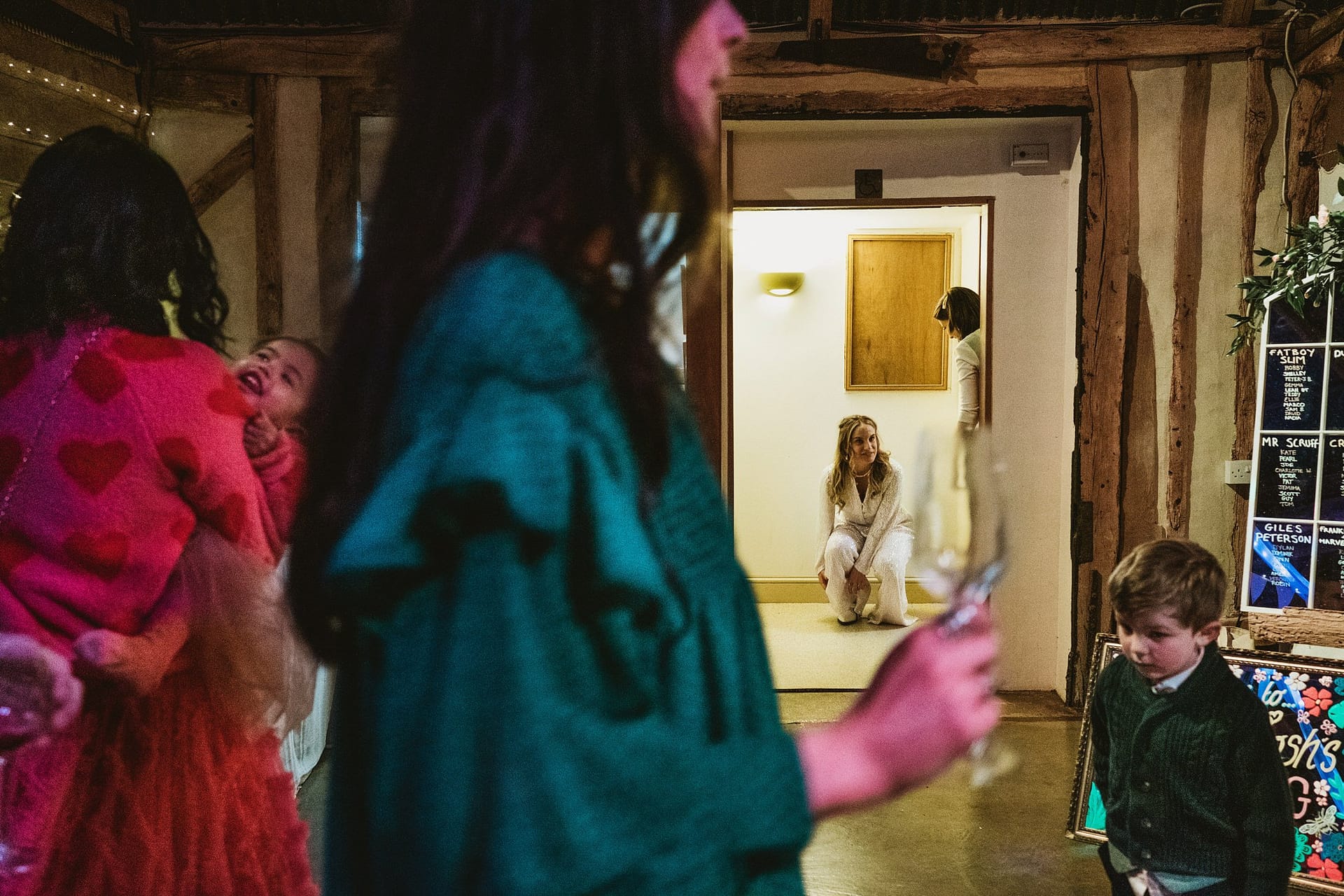 bride and wedding guests during the Alpheton Barns wedding reception