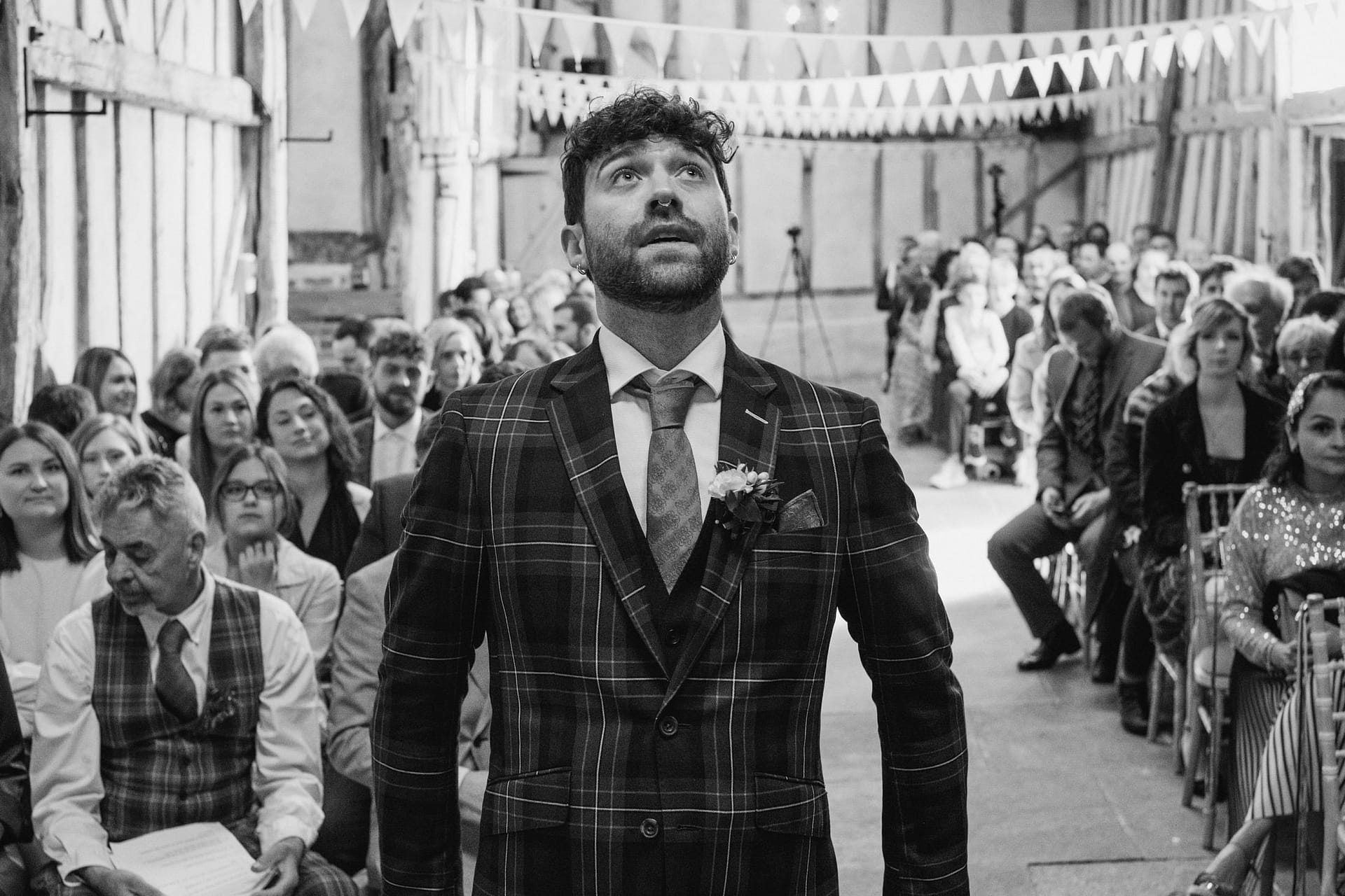 groom looking pensive before Alpheton Barns ceremony