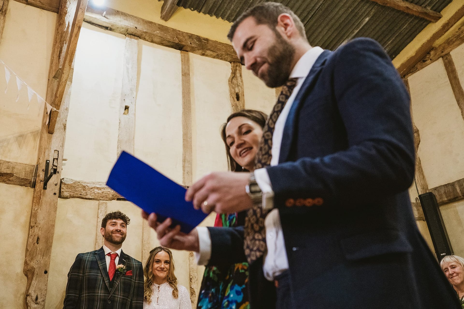 bride and groom during ceremony at Alpheton Barns in suffolk