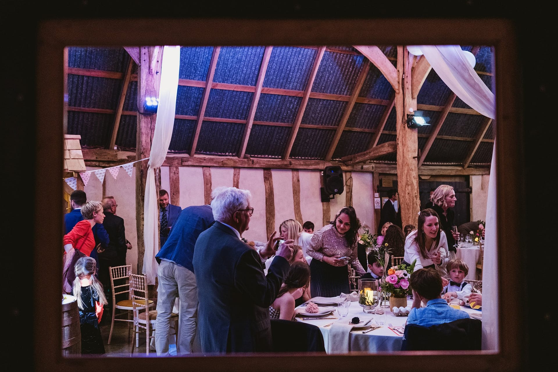 wedding guests at the Alpheton Barns wedding reception