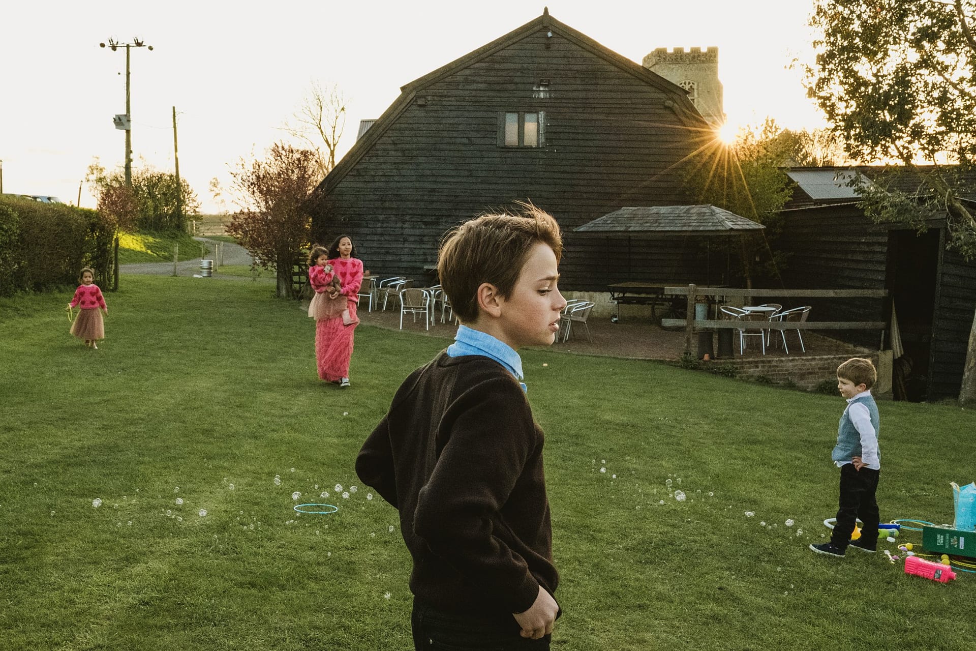 sunsetting at Alpheton Barns suffolk with children playing