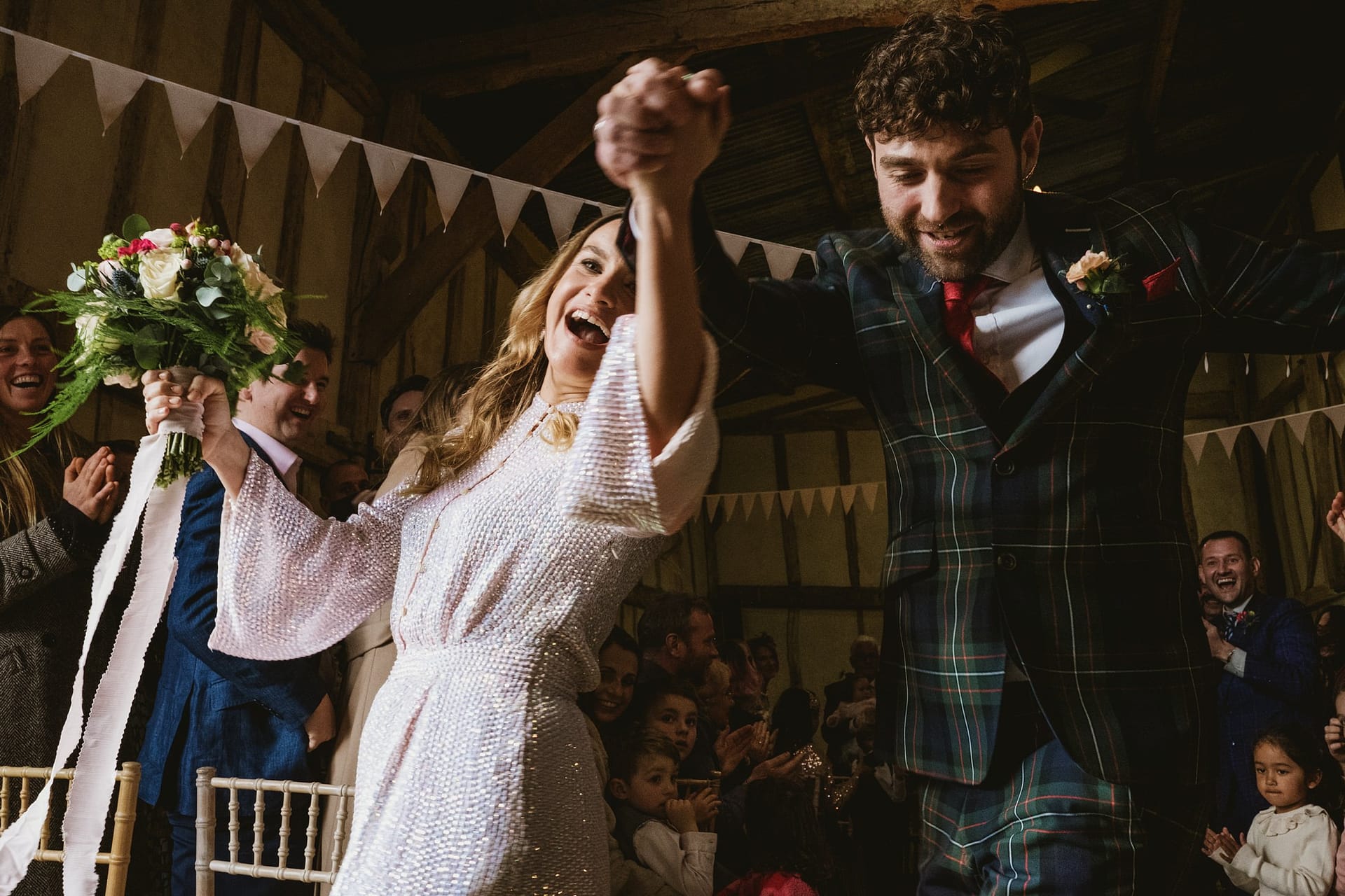 bride and groom wedding entrance at Alpheton Barns