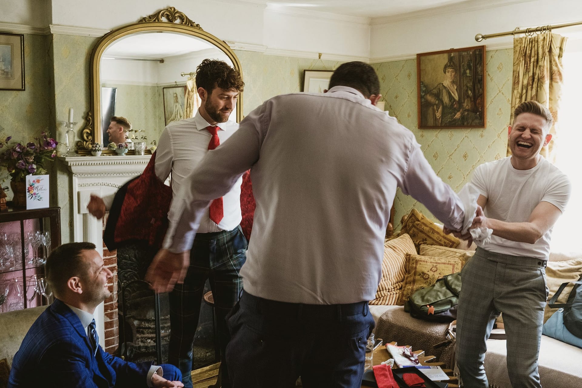 groomsmen attempting to get ready in suffolk