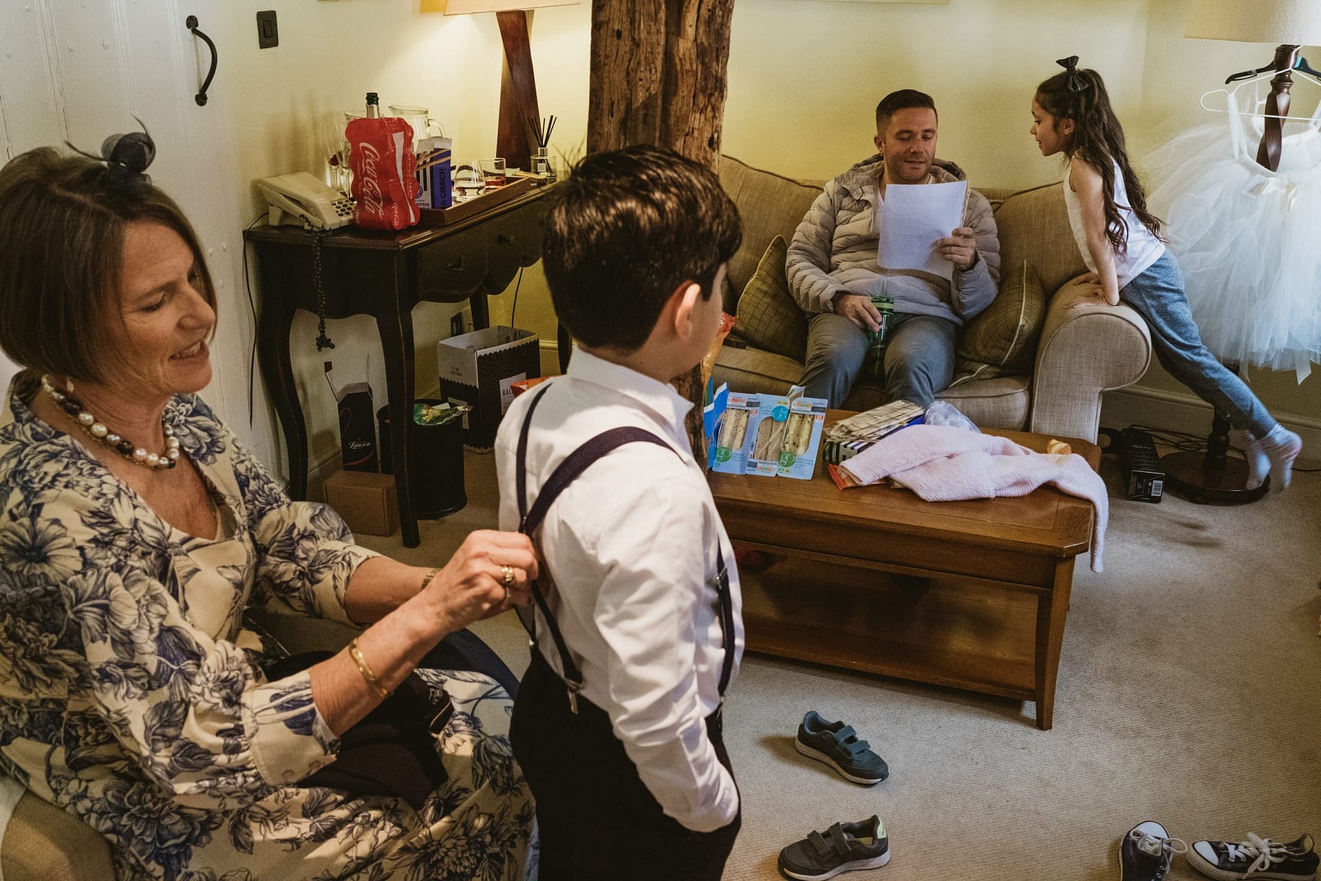 page boy getting ready with flower girl at Alpheton Barns