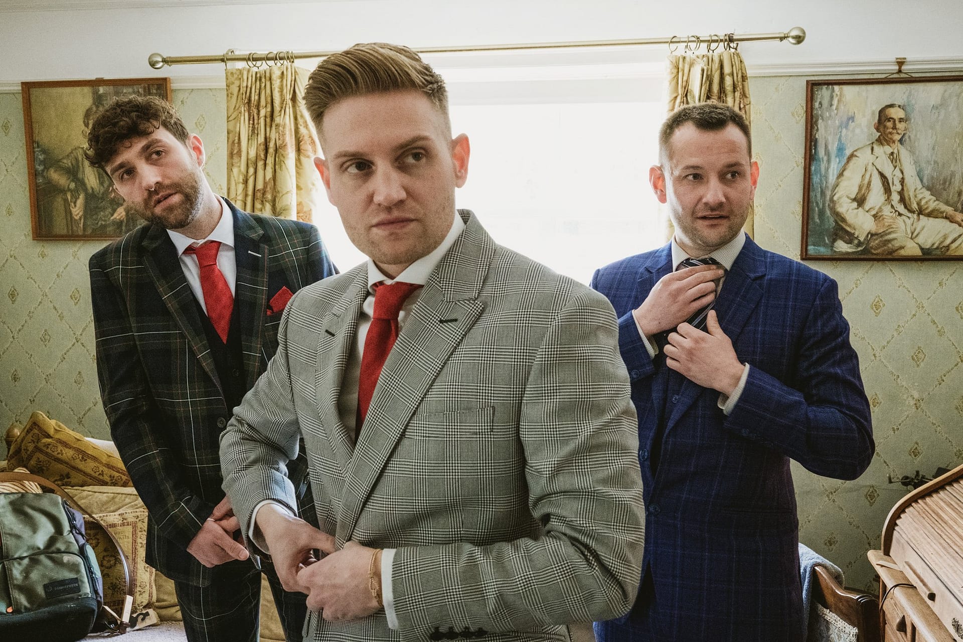 groom and groomsmen all getting in suffolk