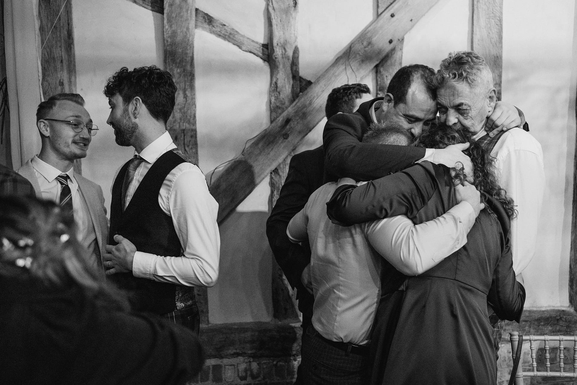 guests hugging after speeches at Alpheton Barns suffolk