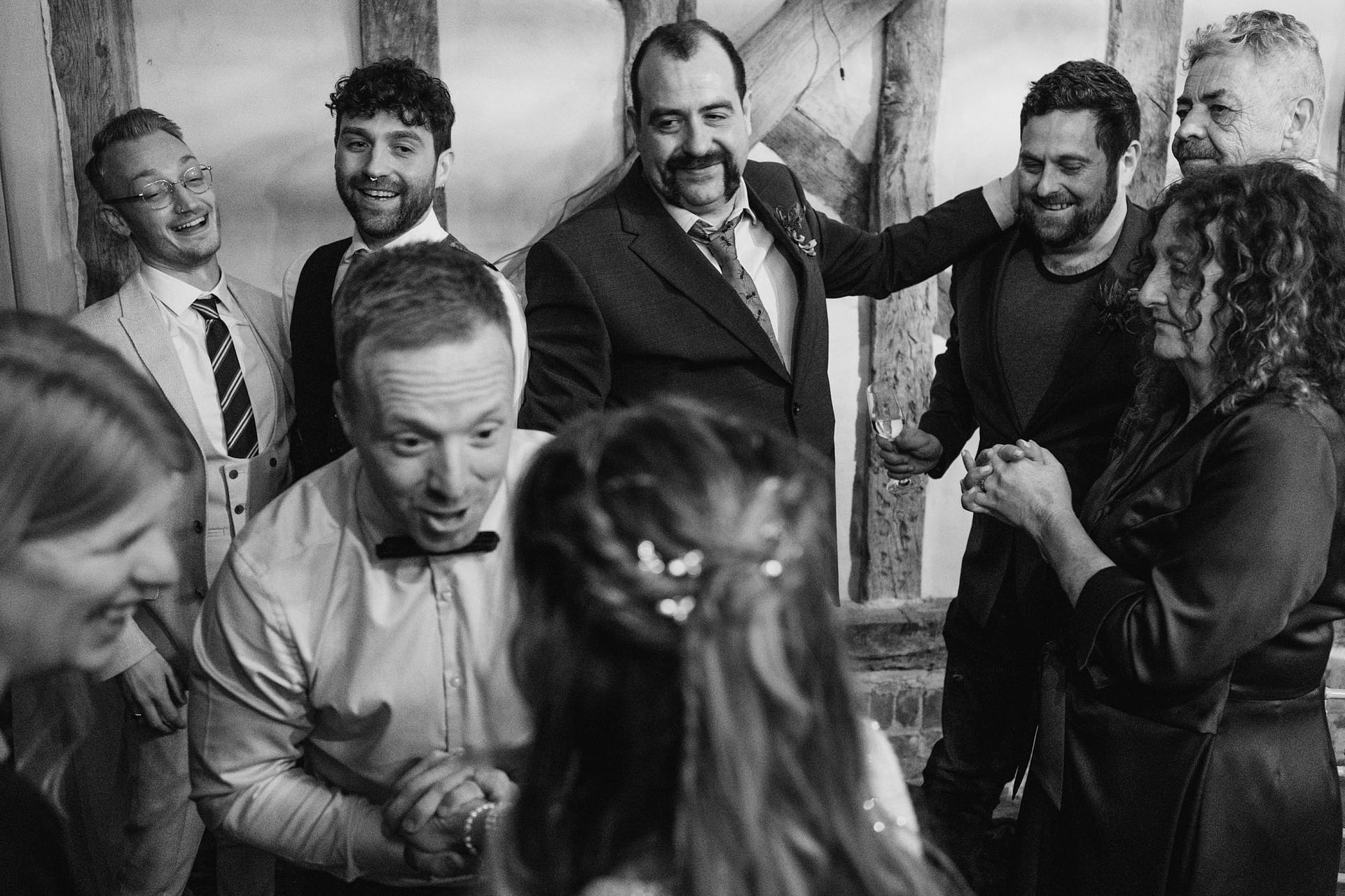 guests hugging and laughing at Alpheton Barns suffolk