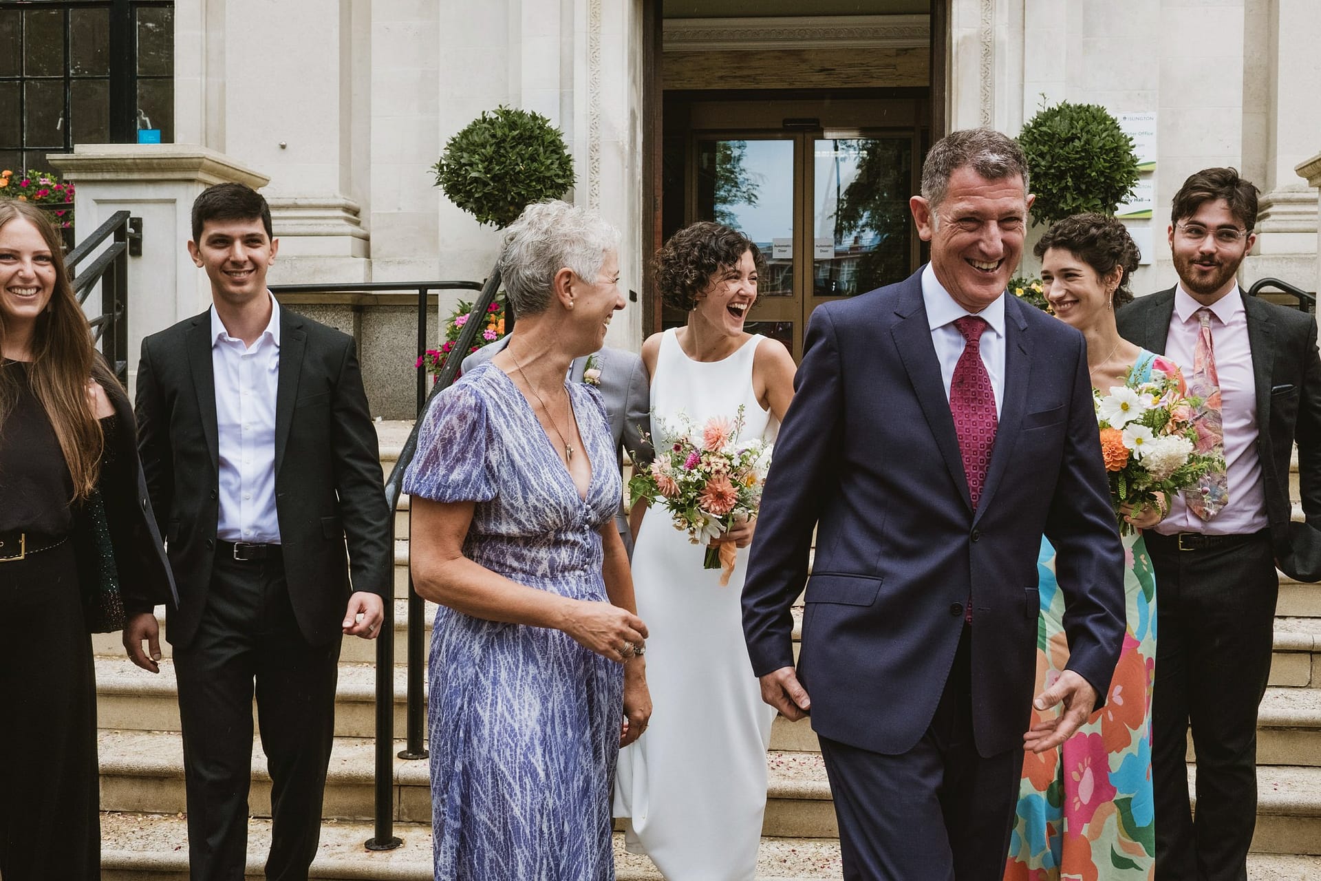 bride with wedding guests at islington town hall