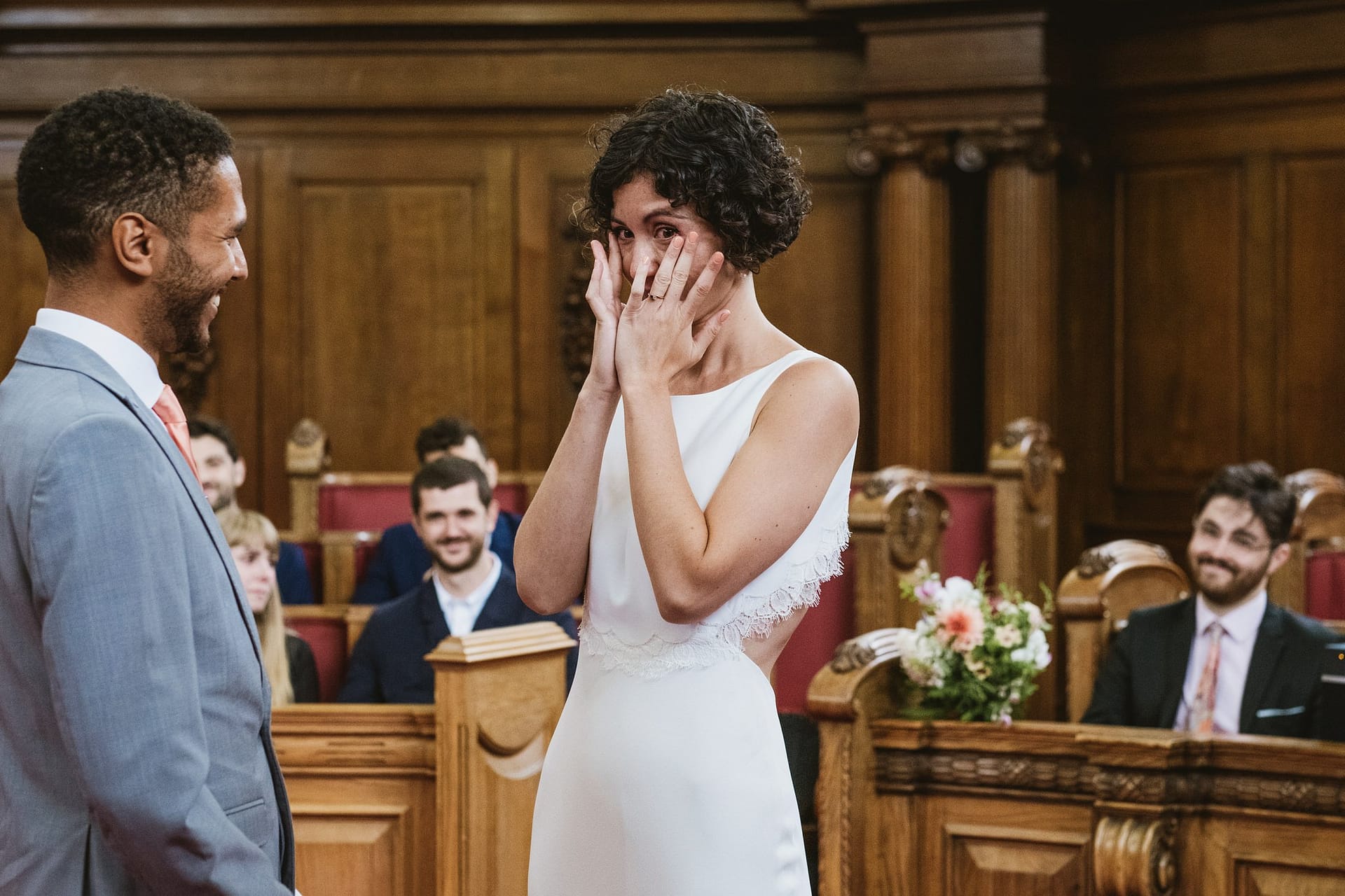 bride and groom getting emotional during the islington town hall wedding ceremony