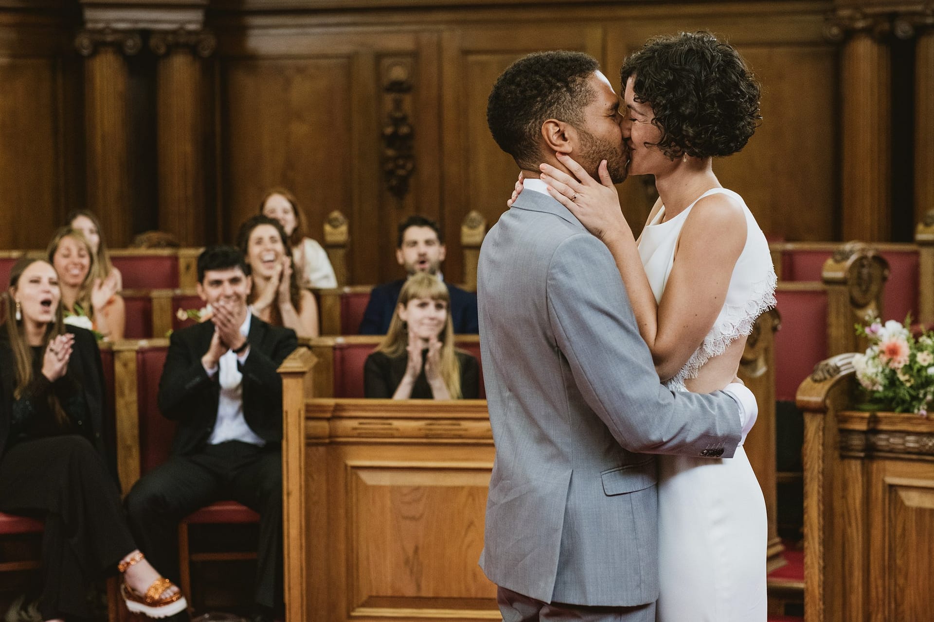bride and groom's first kiss at Islington Town Hall
