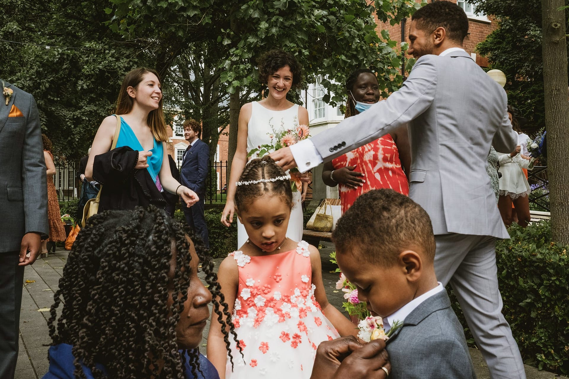 a layered image of an informal wedding grouping at Islington Town Hall