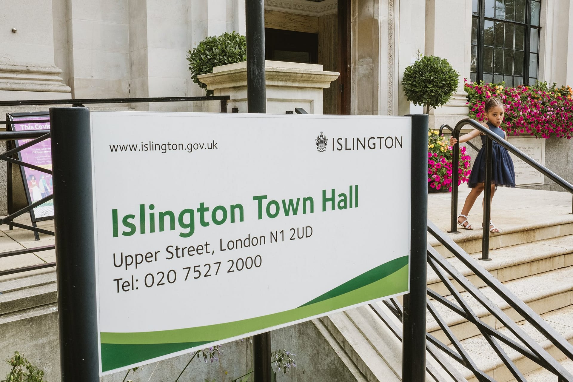 flower girl on steps at Islington Town Hall