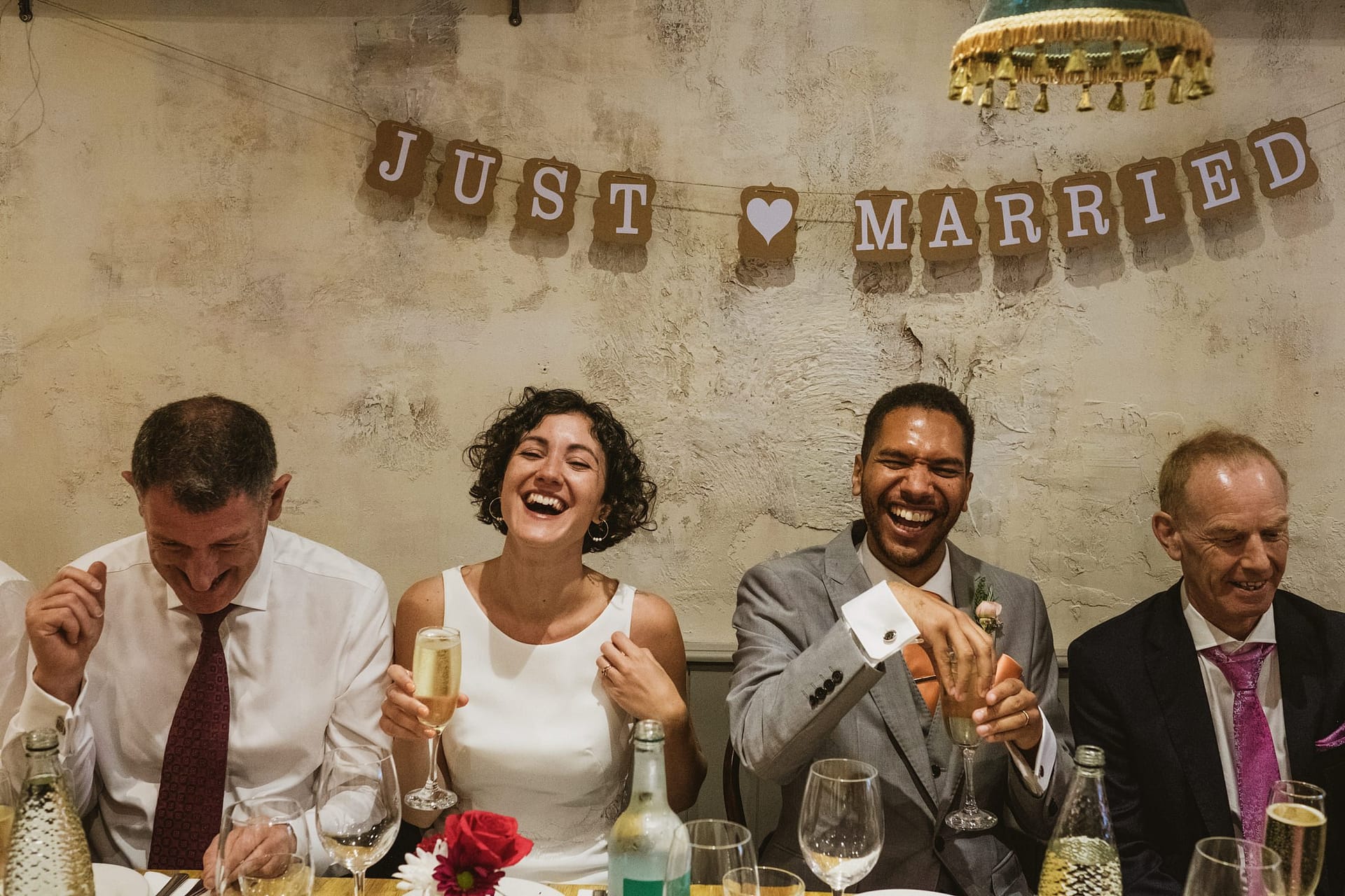 just married at La Farola restaurant bride and groom laughing
