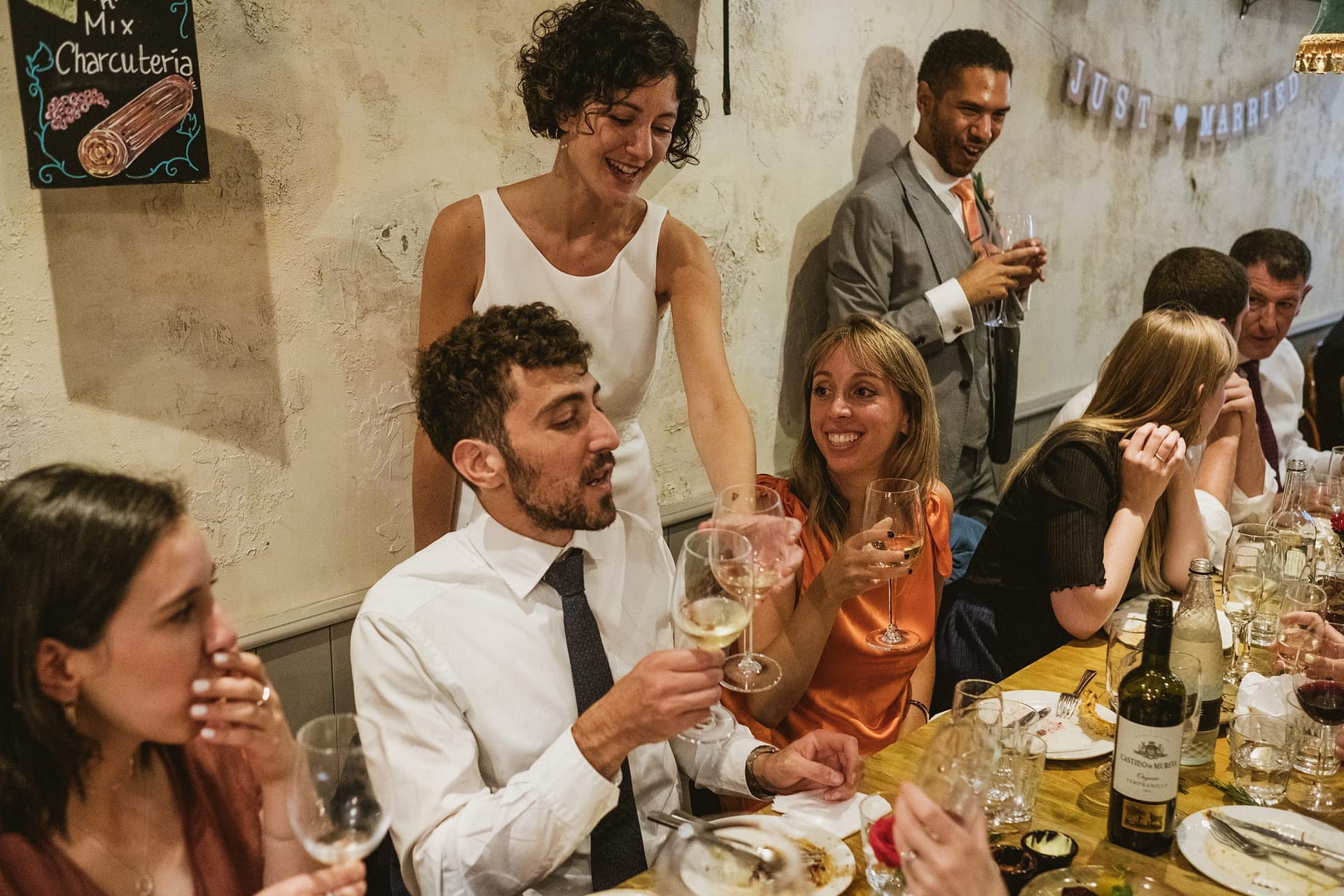 La Farola restaurant bride and groom greeting guests at table