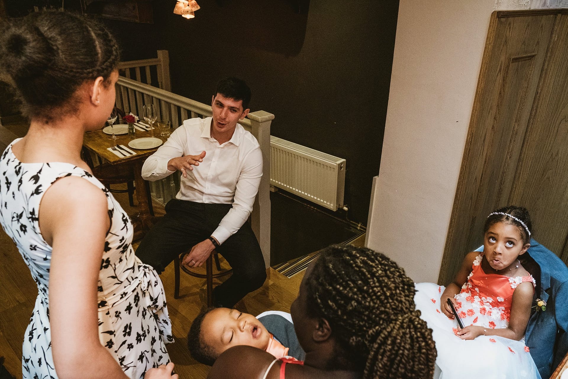 unimpressed flower girl at La Farola restaurant in london