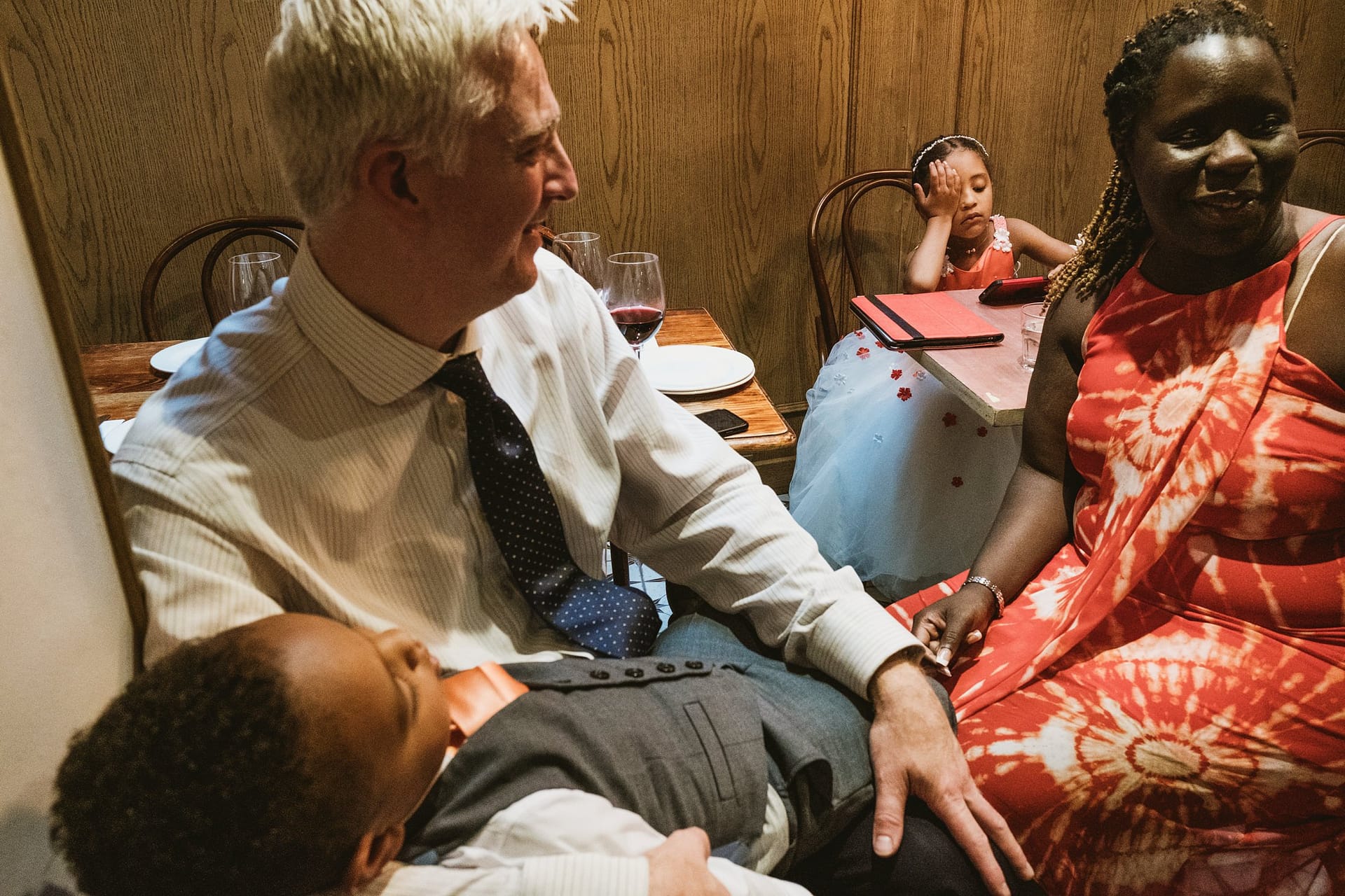 flower girl and page boy sleeping at La Farola restaurant london