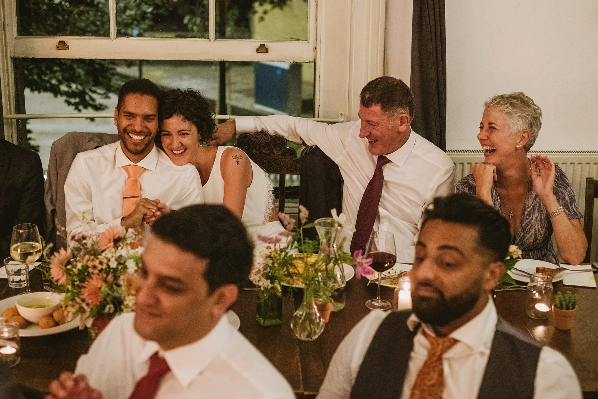 bride groom hugging during wedding breakfast at Prince Albert Camden