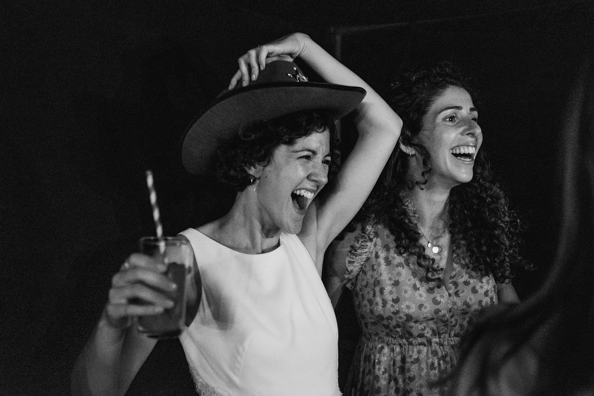 bride in photo booth wearing cowboy hat at Prince Albert pub