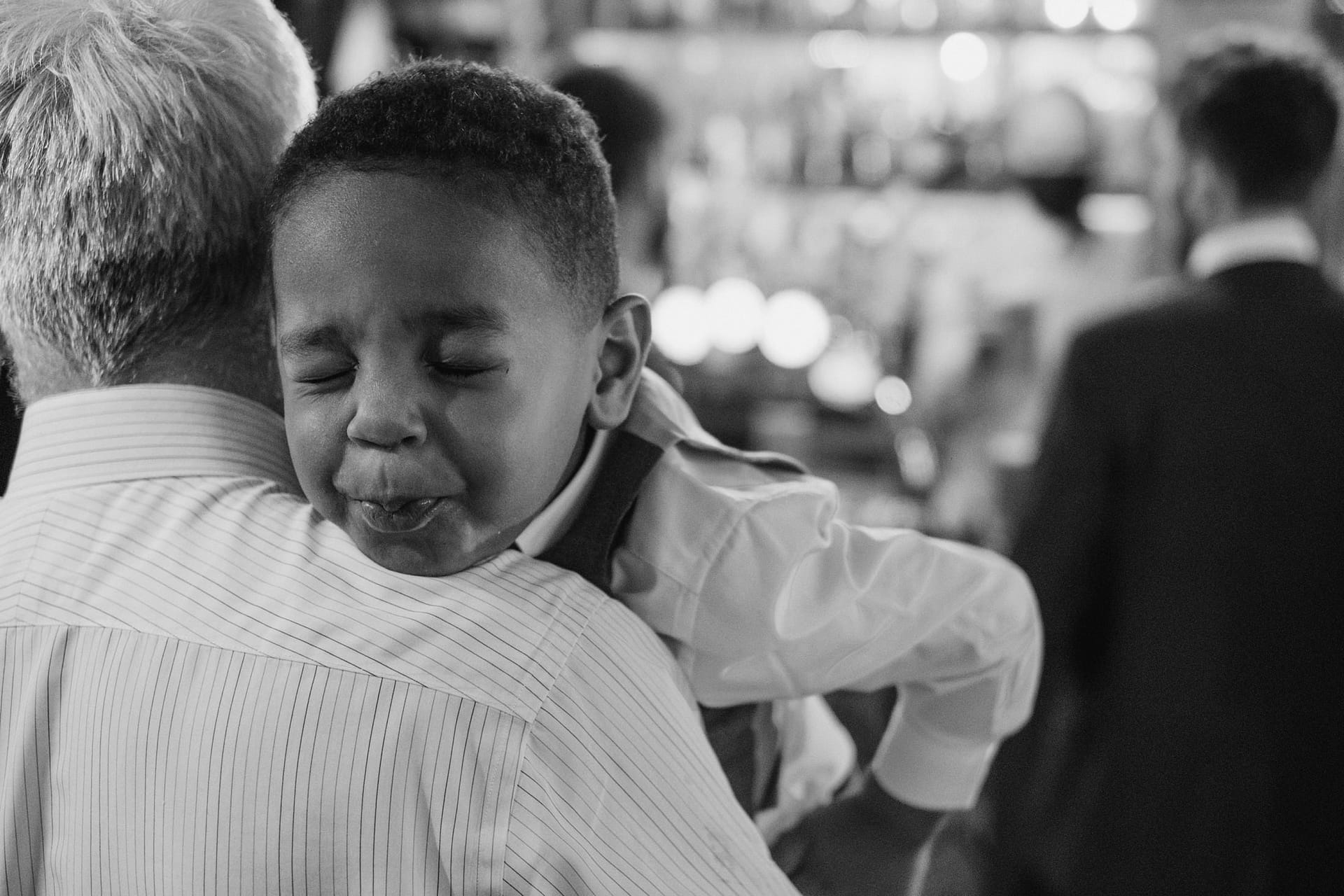 page boy blowing a raspberry in black and white at Prince Albert pub