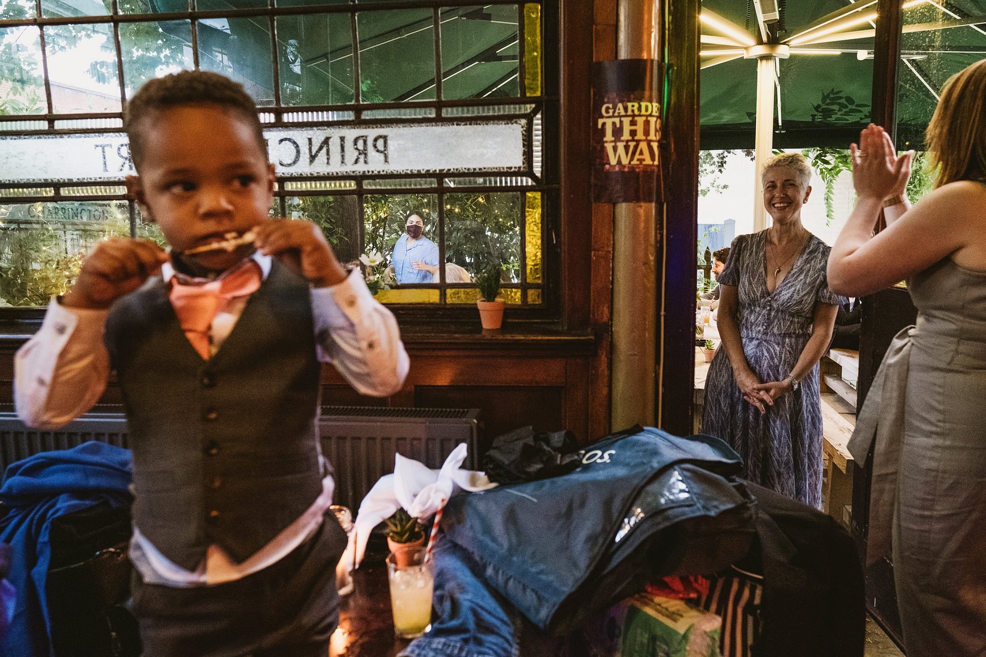 page boy eating canapés at Prince Albert pub in london
