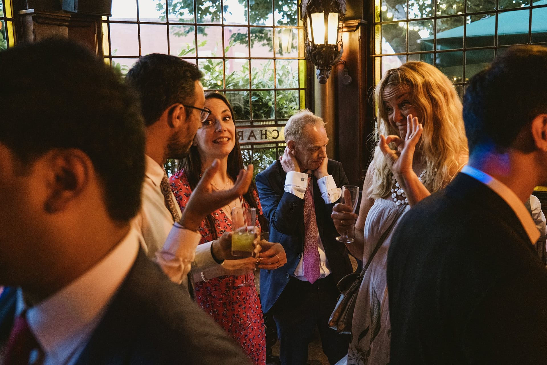 wedding guests chilling out at Prince Albert pub in Camden