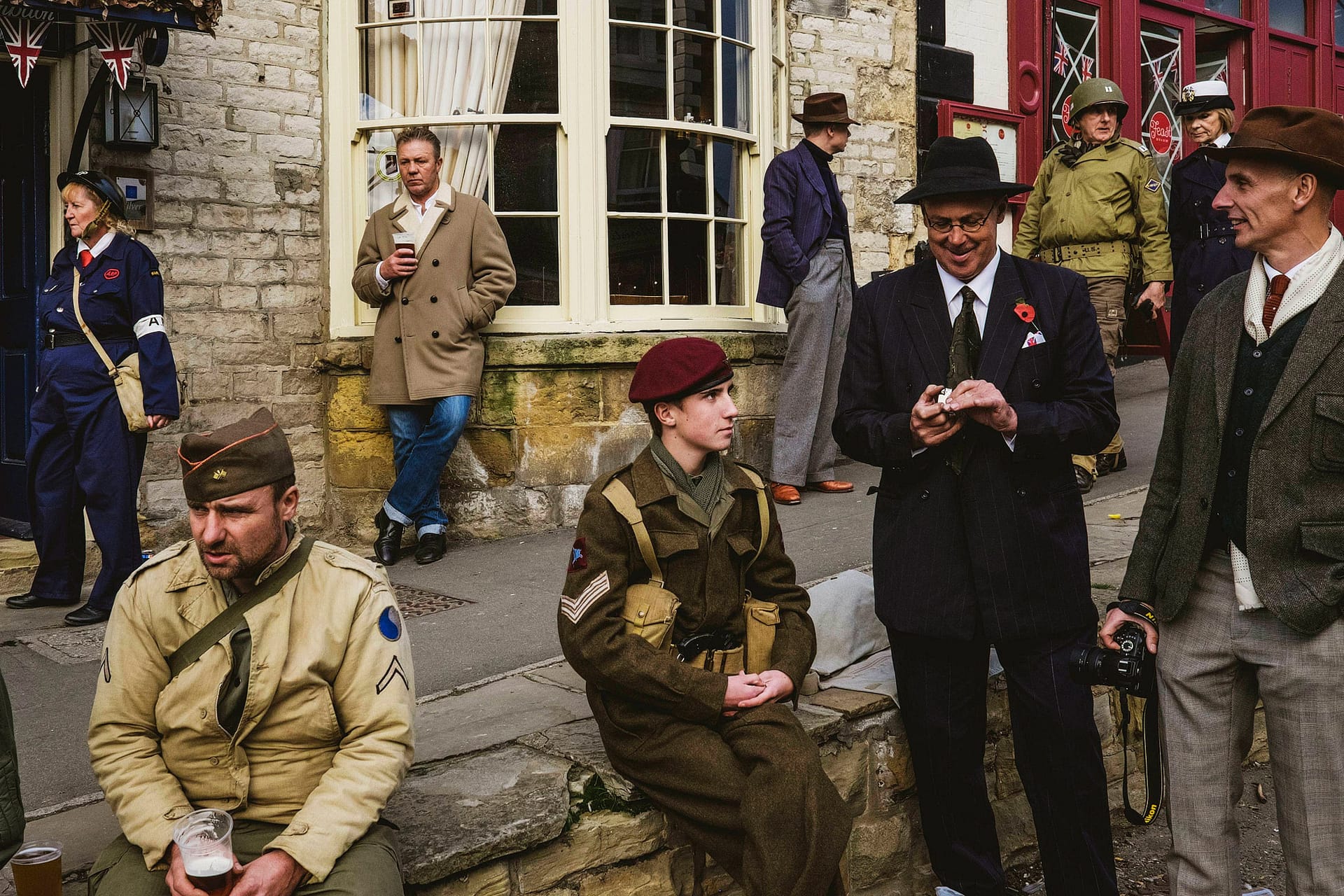 Street photography commission in Pickering, UK. Soldiers and WWII figures stand around the town's highstreet at Pickering War Weekend.