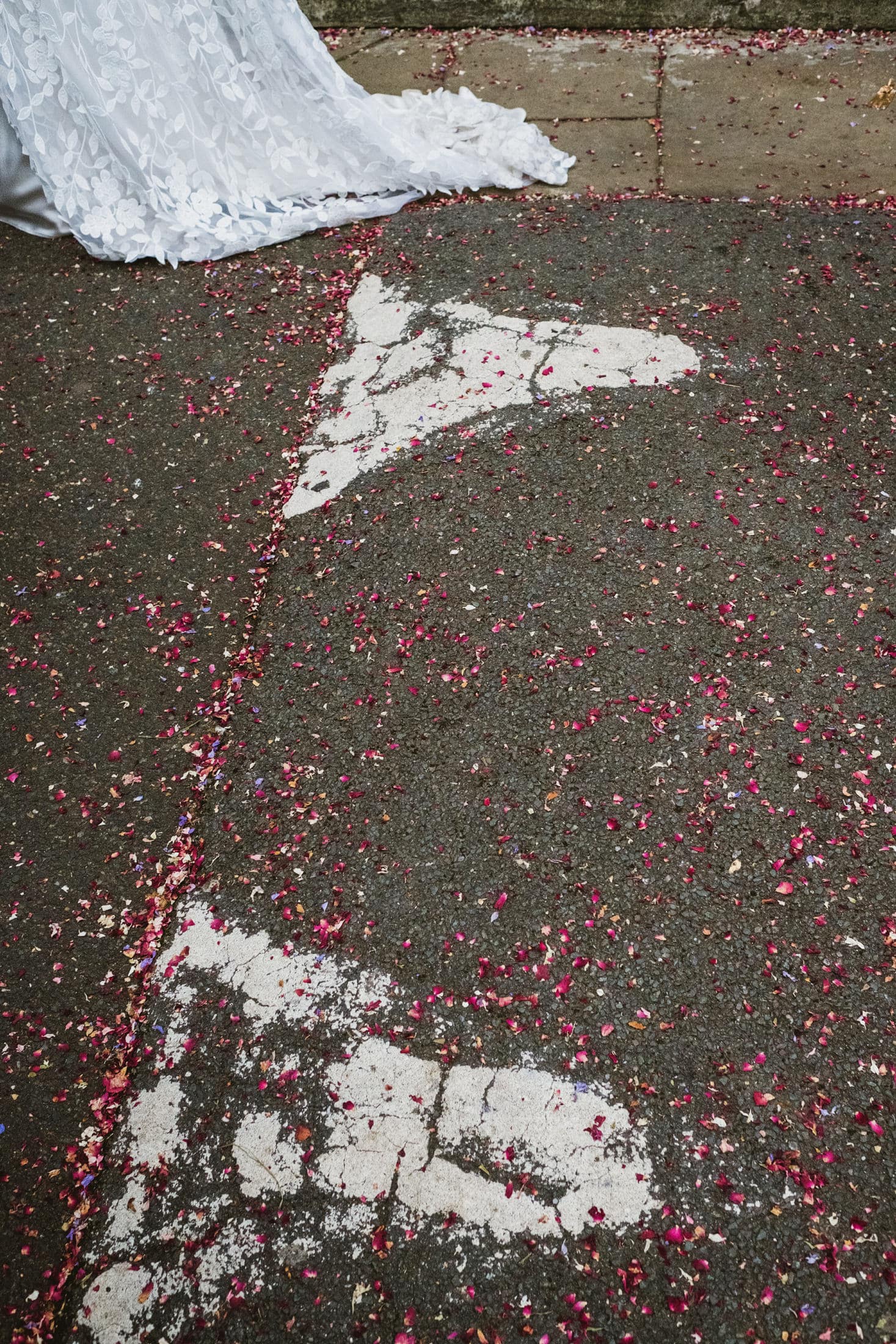 brides dress and signs matching at asylum chapel