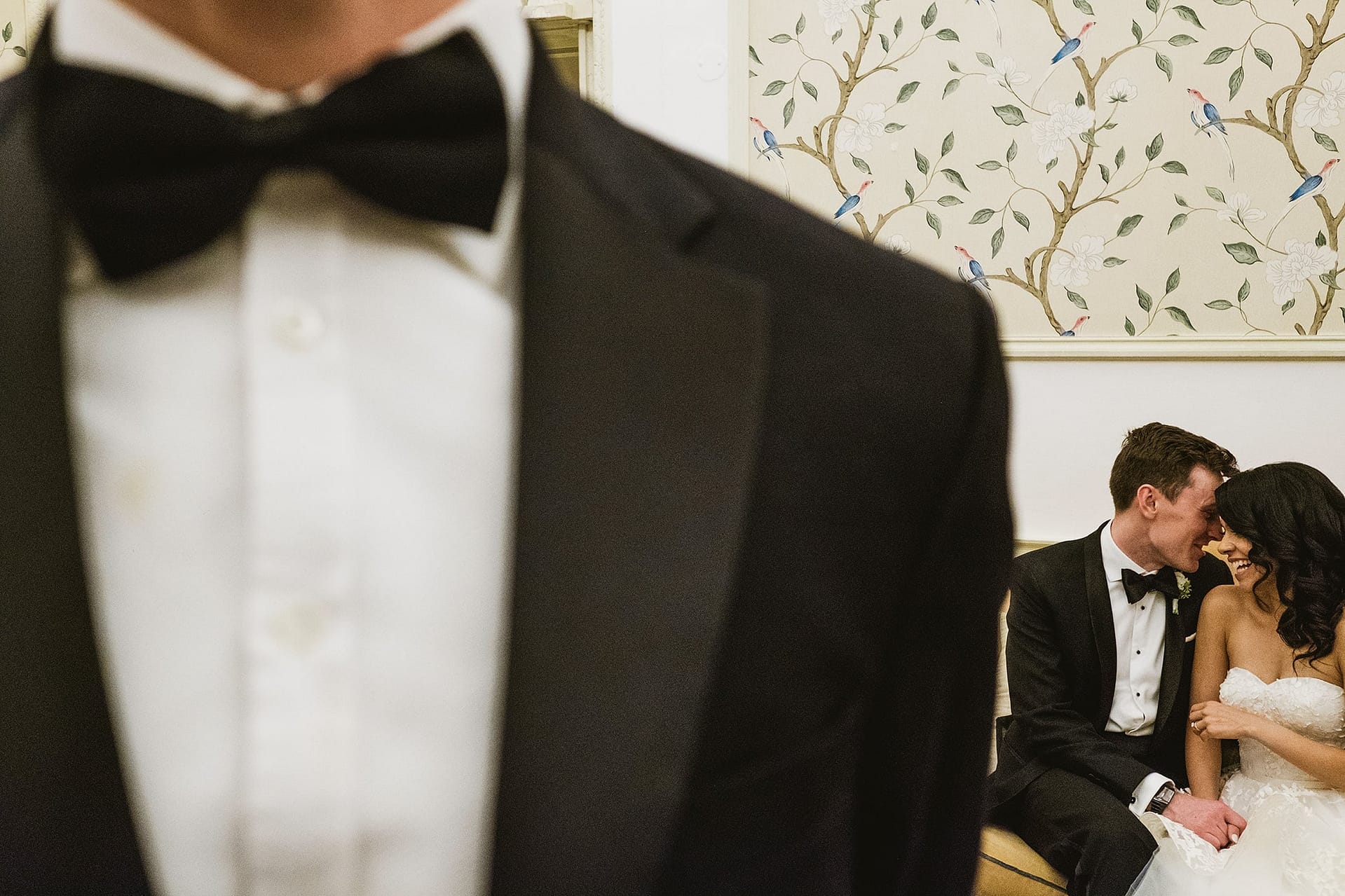 Hedsor House Wedding Photography London. Bride and groom portrait with bow tie foreground.