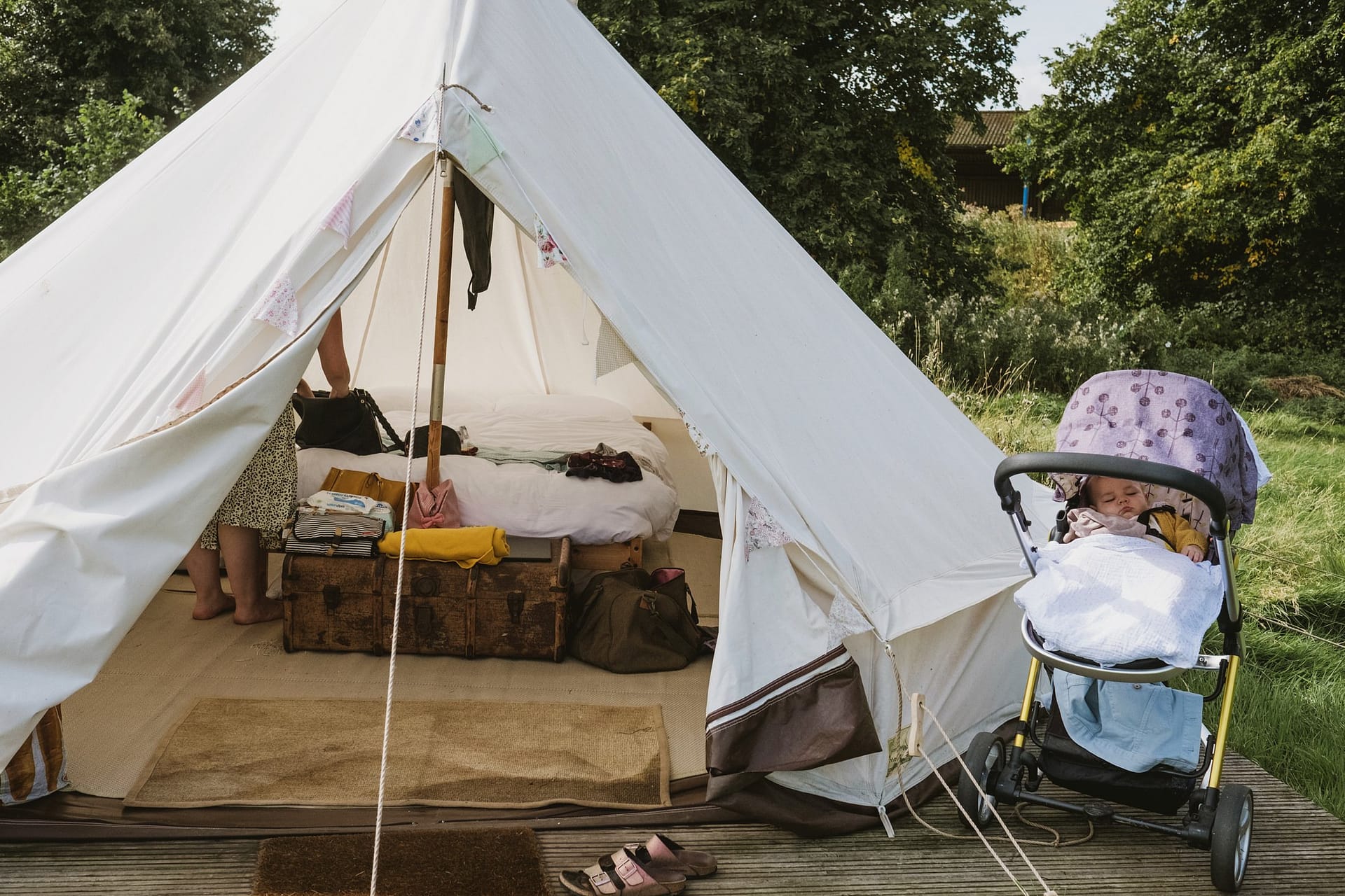 baby asleep in the pram at Home Fram Glamping