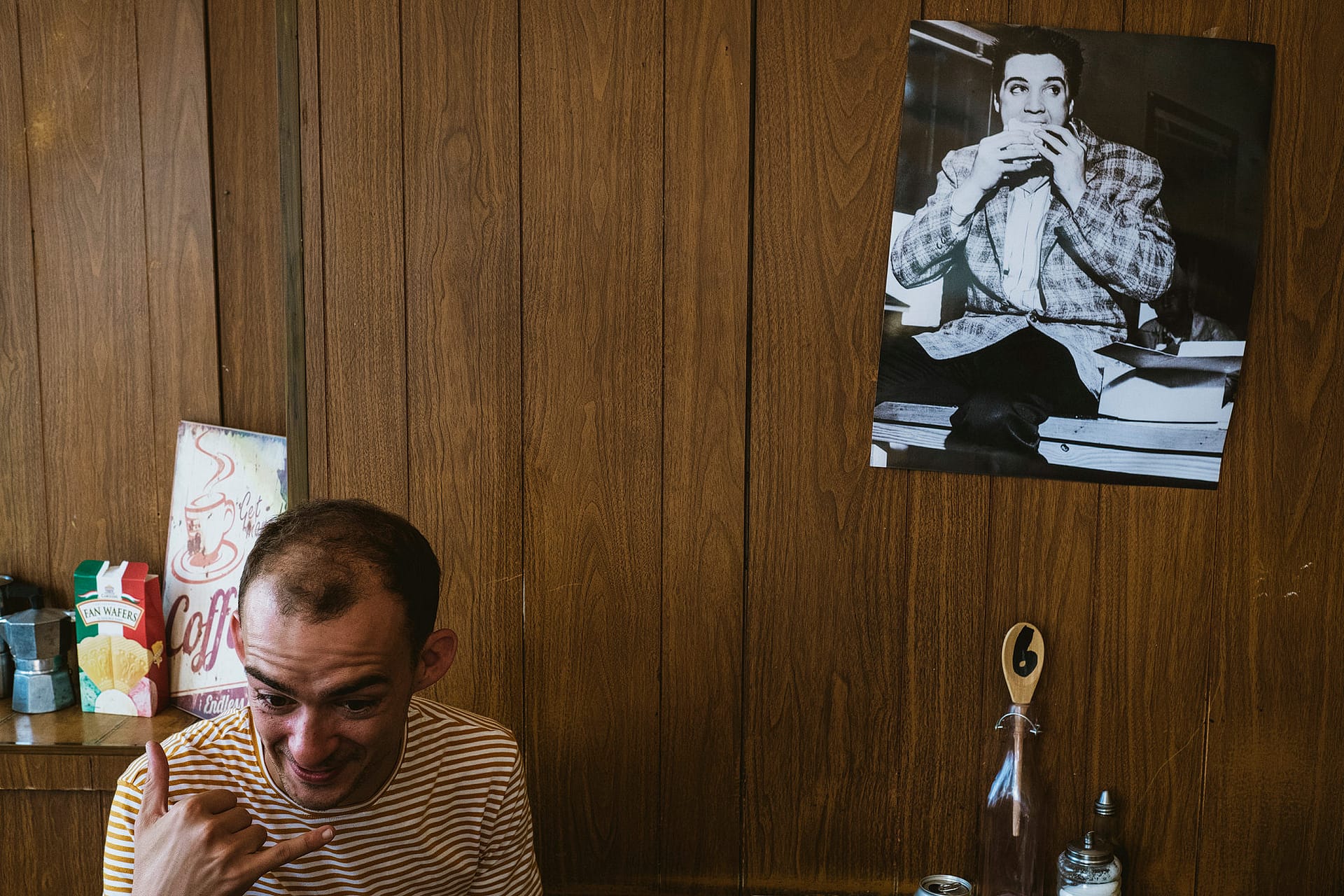 Relaxed groom prep wedding photograph