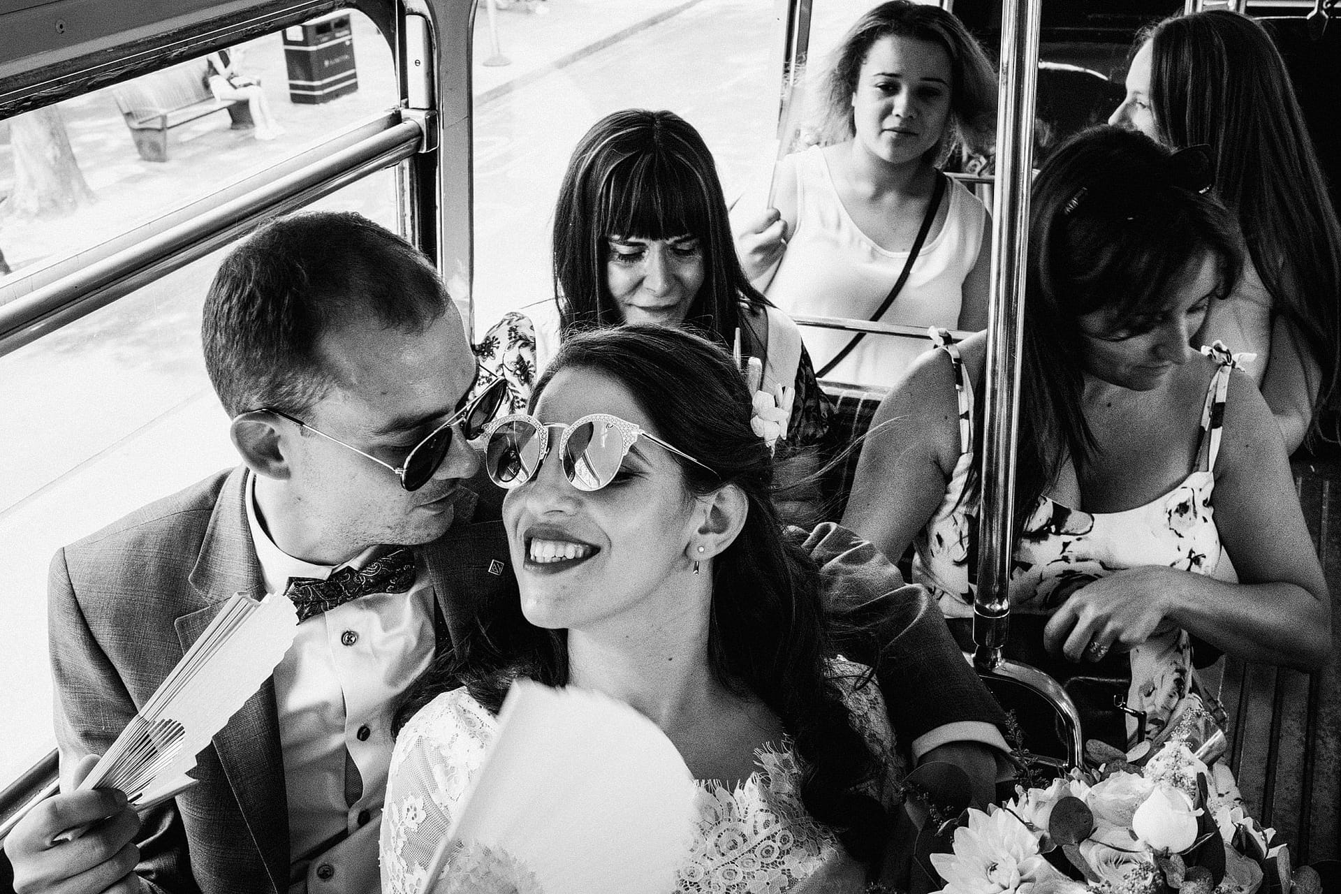 Bride and groom on London Red Bus