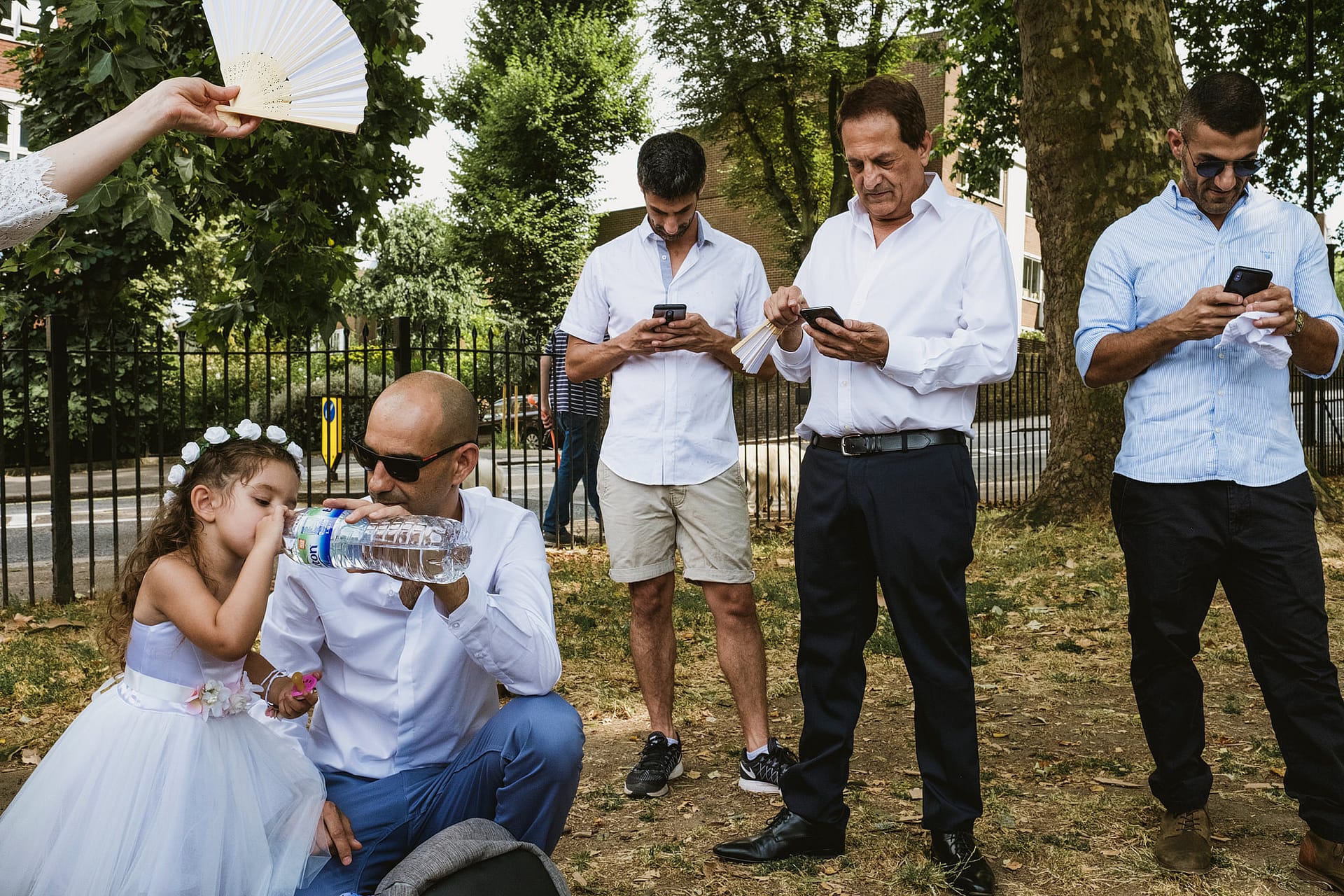 Guests texting at weddings, Islington Wedding Photographers