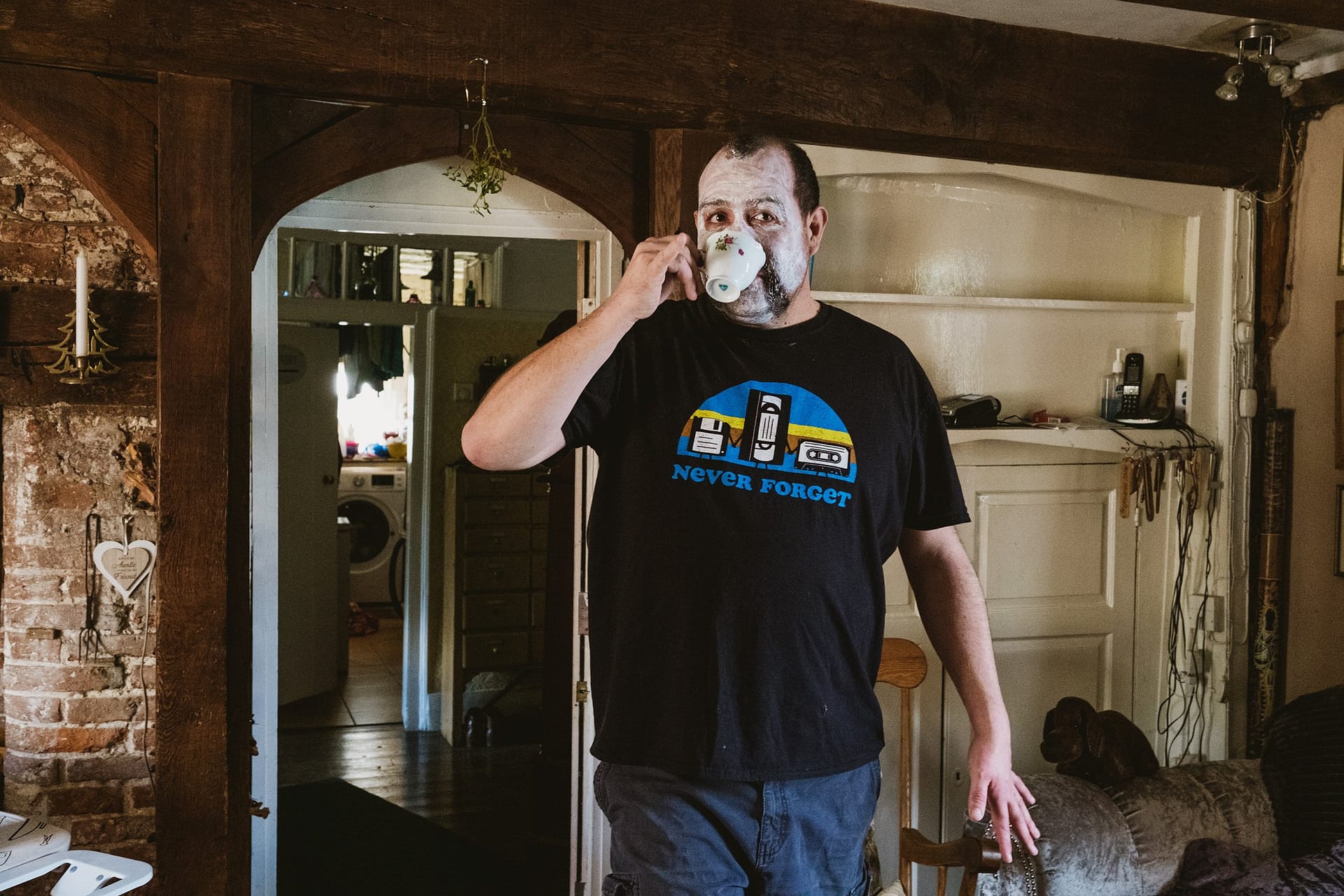 comedic photo of a groomsmen getting ready in suffolk