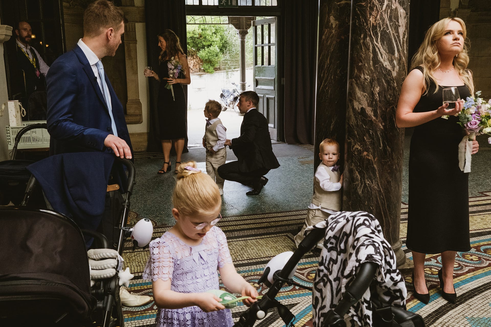 Family gathering indoors with children and adults.
