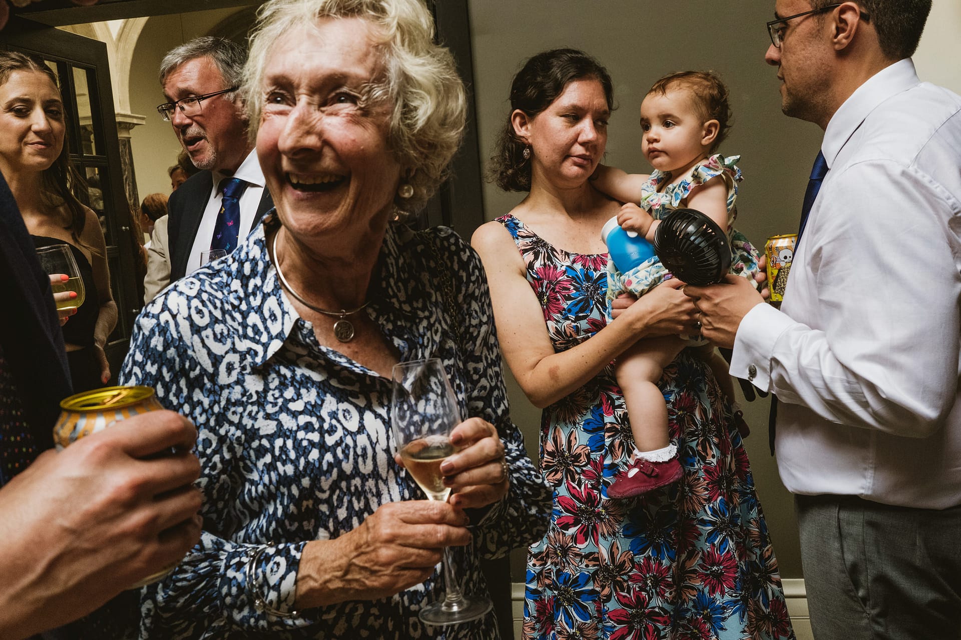 People socialising at a lively gathering.