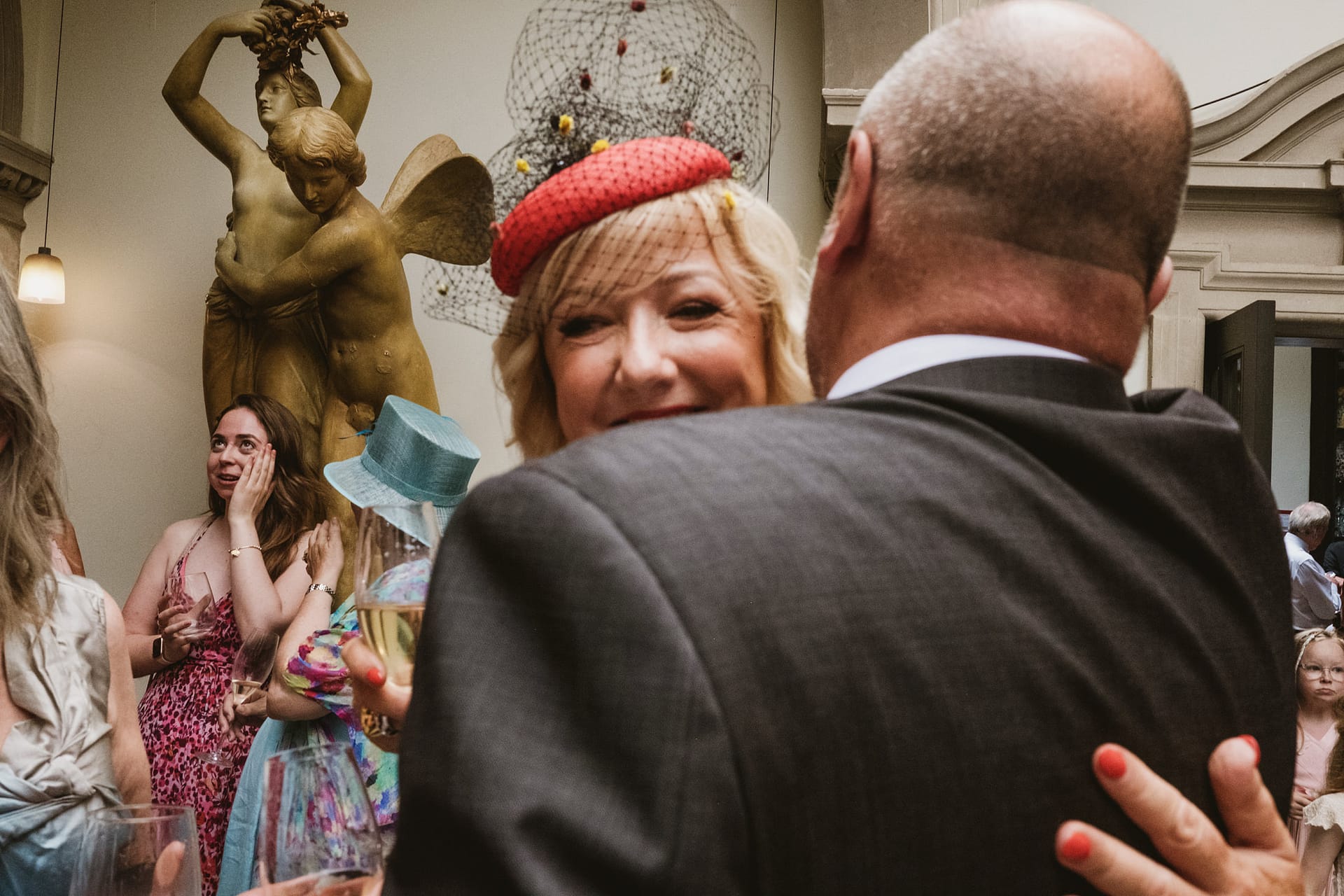 Guests mingling at a stylish indoor gathering