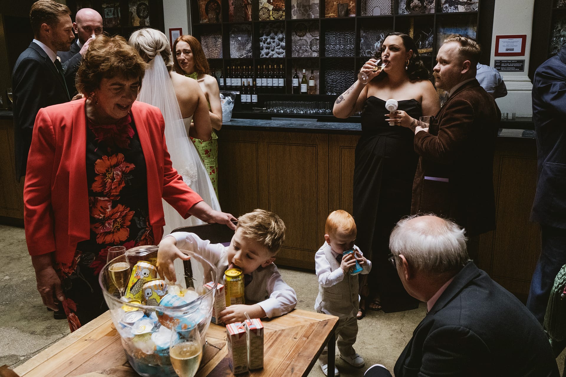Guests enjoying drinks at a wedding reception