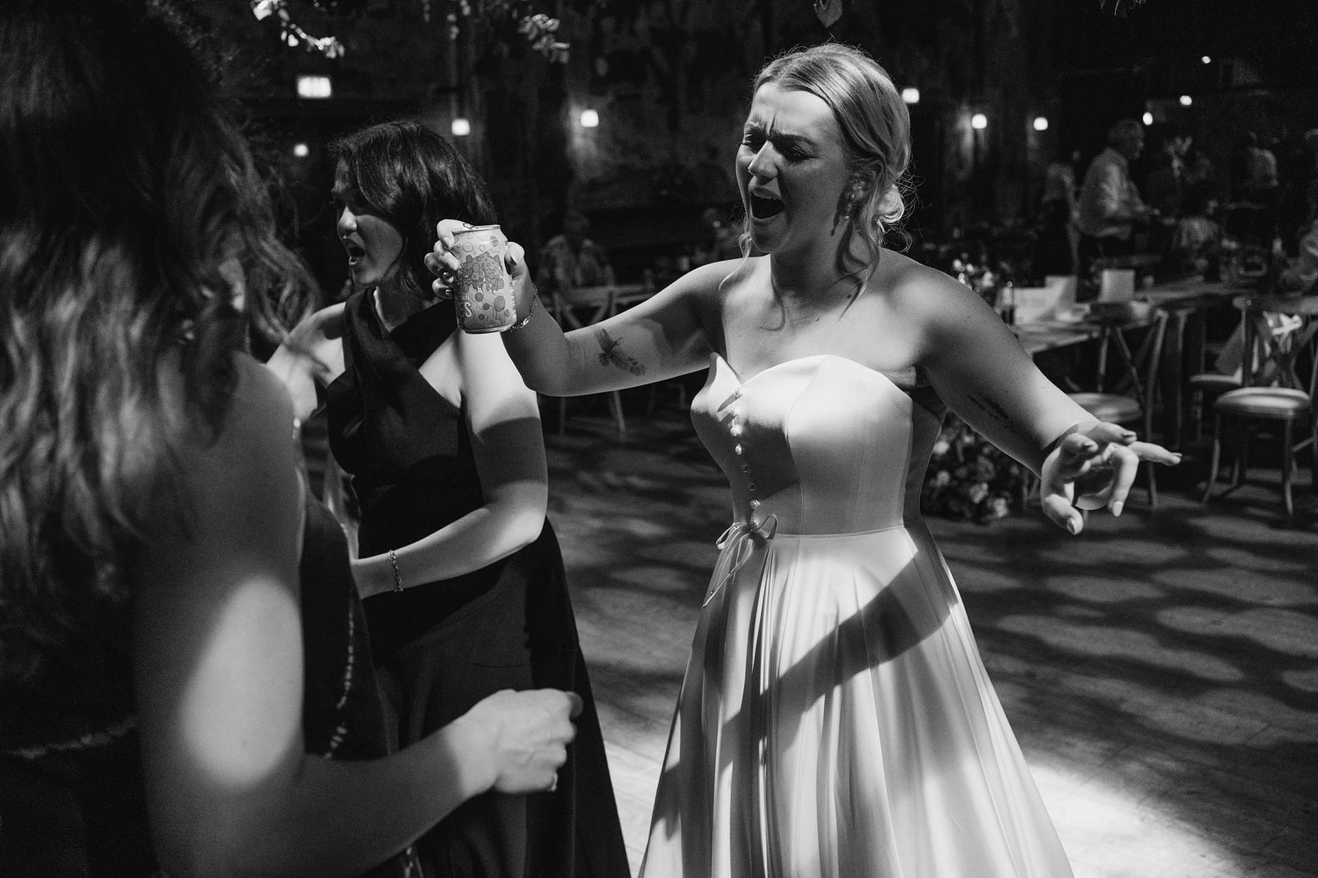 Women dancing and celebrating at a party.