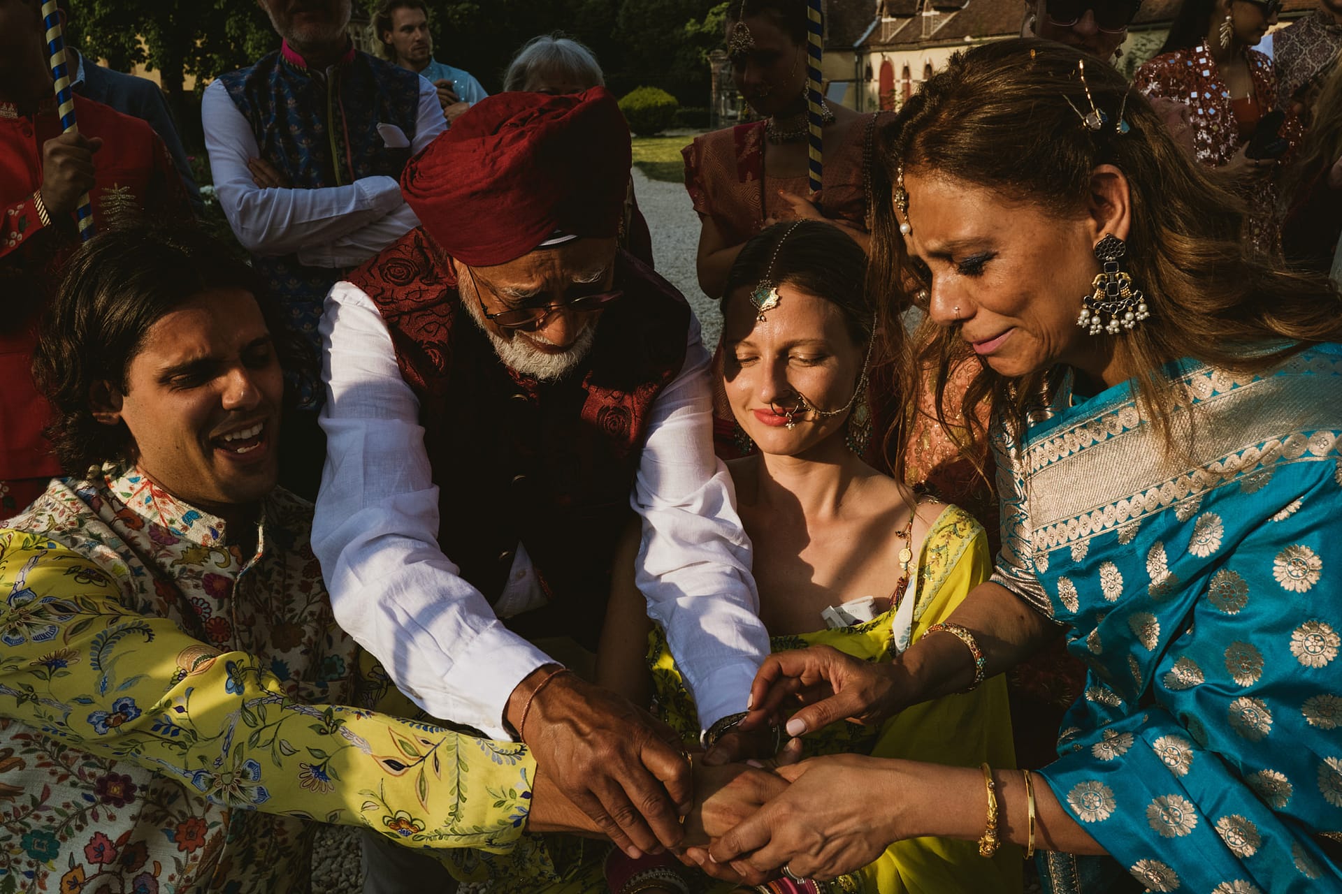 Mendhi wedding ceremony outside on the grounds of the Chateau Du Fey