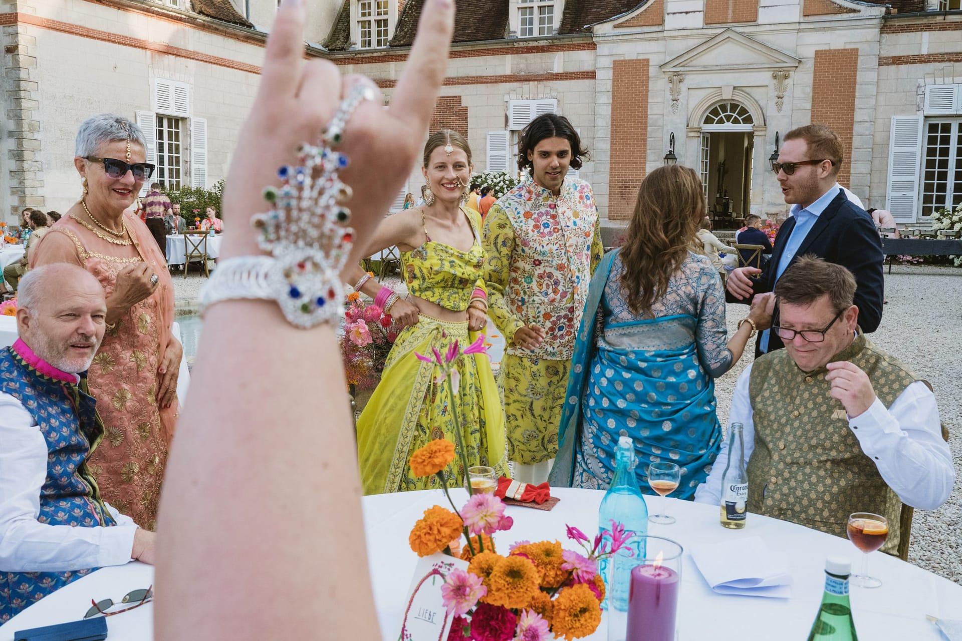 Bride and groom greet their guests at the wedding reception at Chateau du Fey in France
