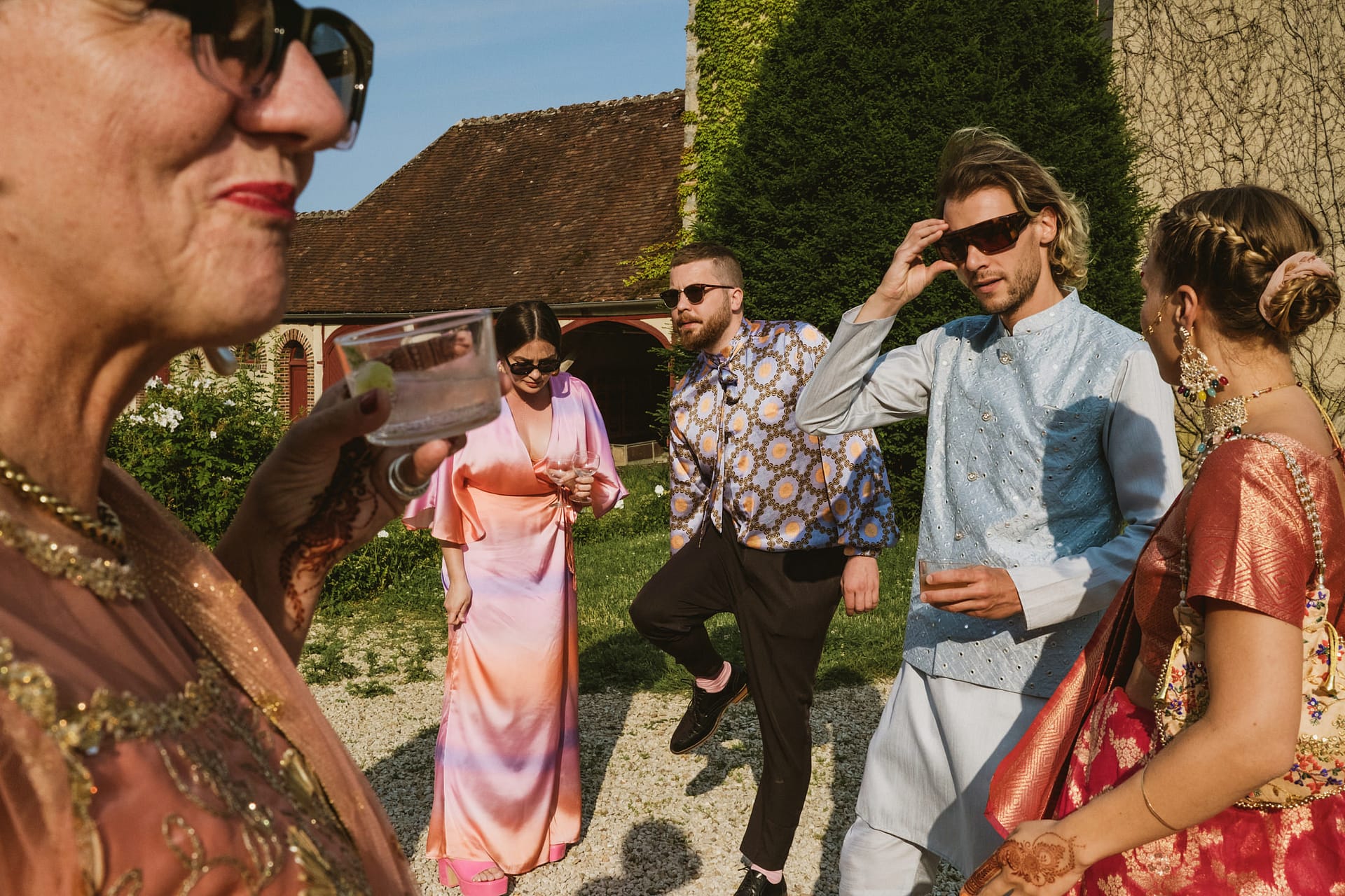 wedding guests in the sun at Chateau du Fey in France