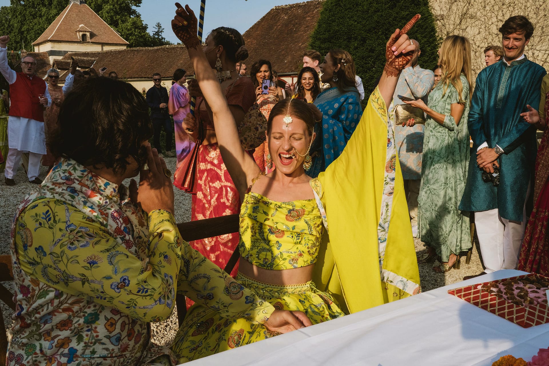 the bride celebrating during the mendhi party Chateau du Fey in France