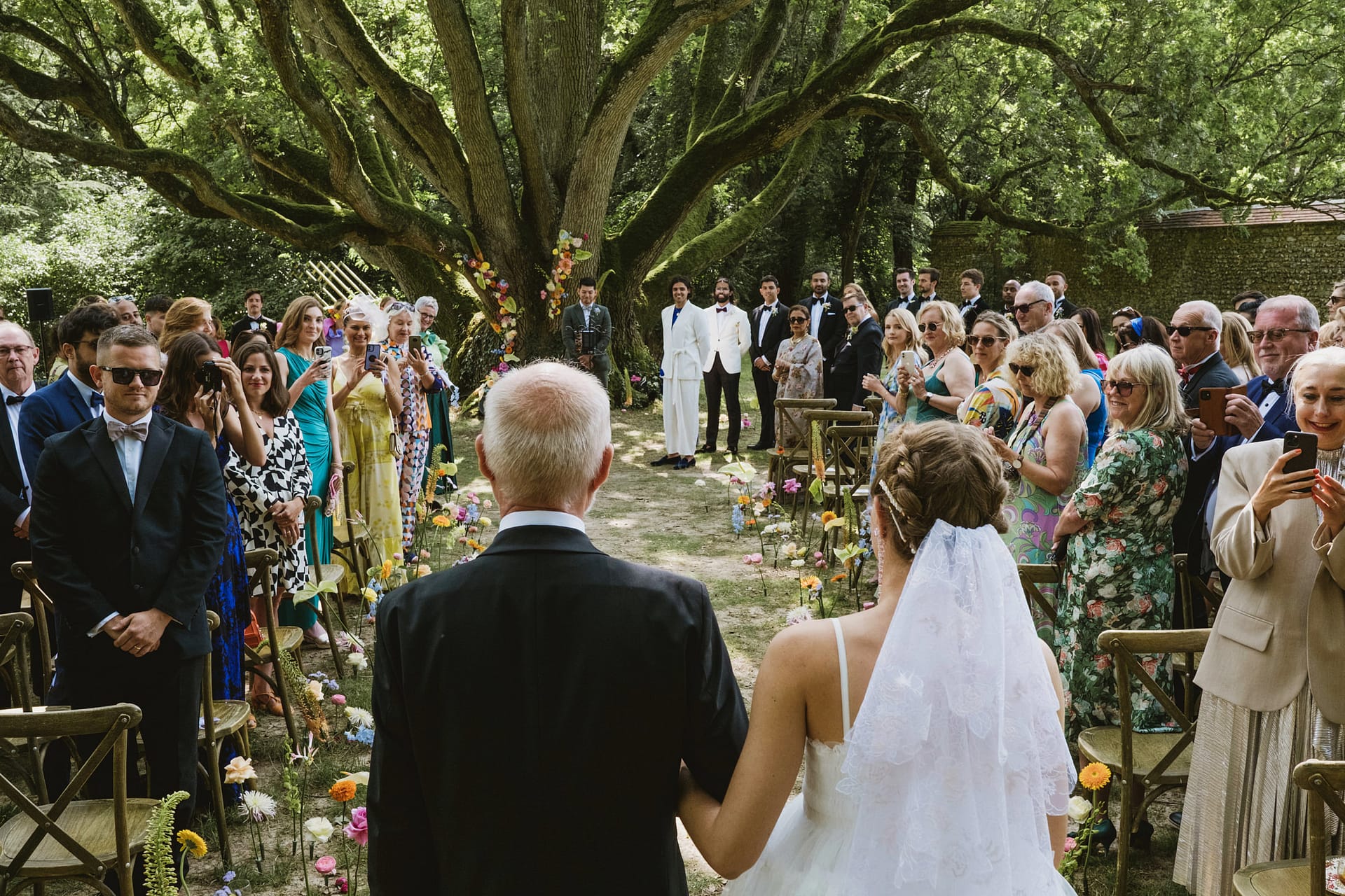 Chateau du Fey wedding ceremony. The bride and father make their entrance