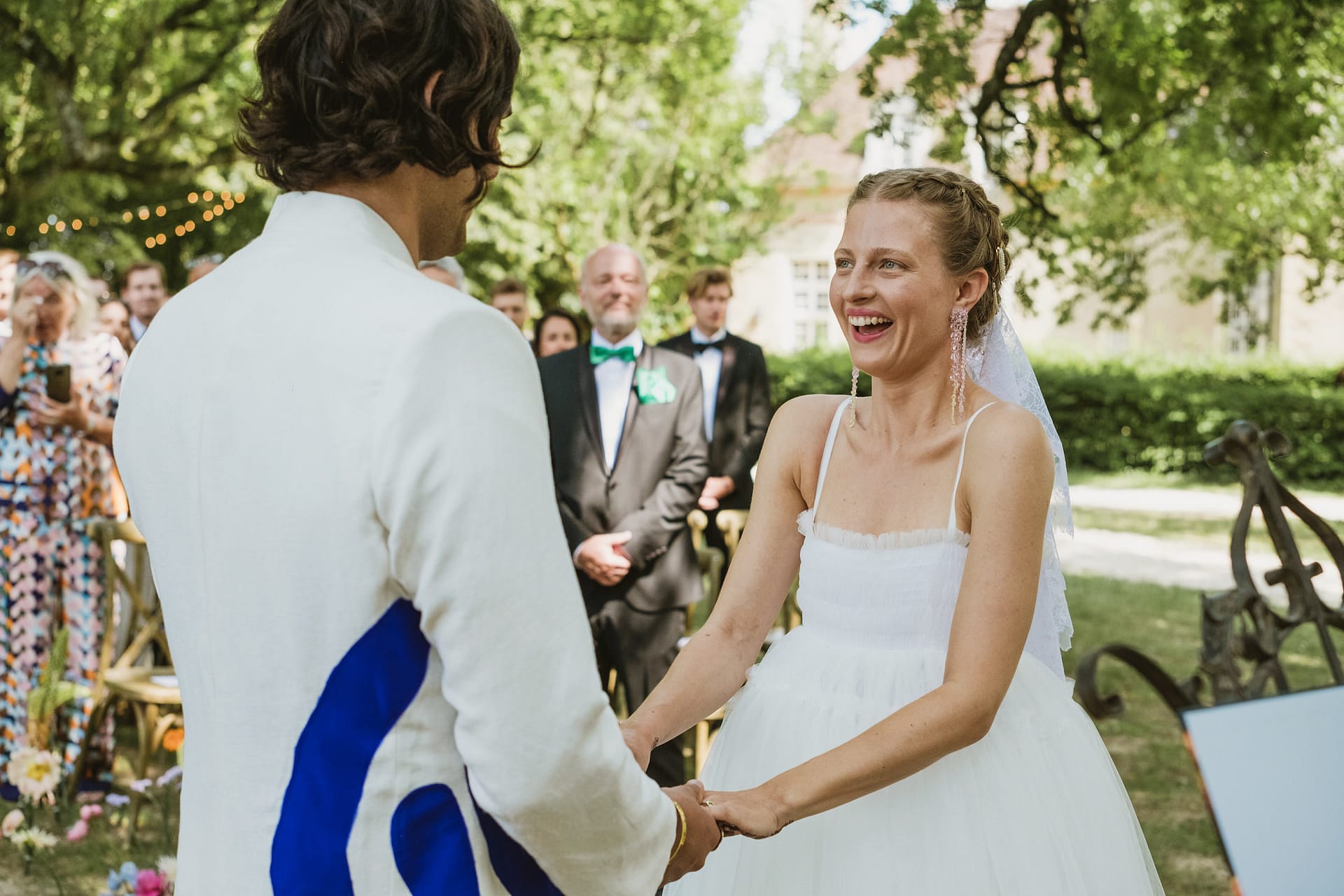 bride and groom exchange vows at Chateau du Fey in France