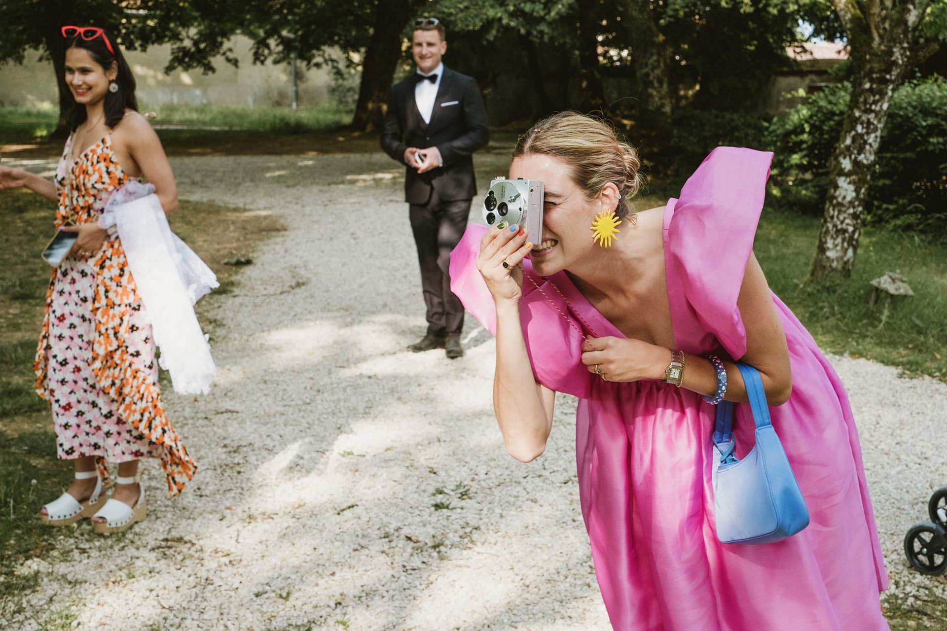 wedding guest photographing at Chateau du Fey in France