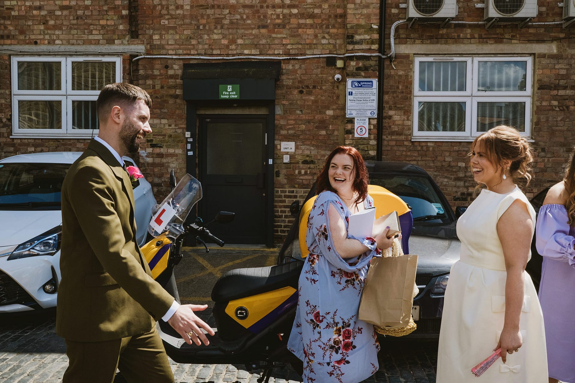 People chatting happily outside Clapton Country Club