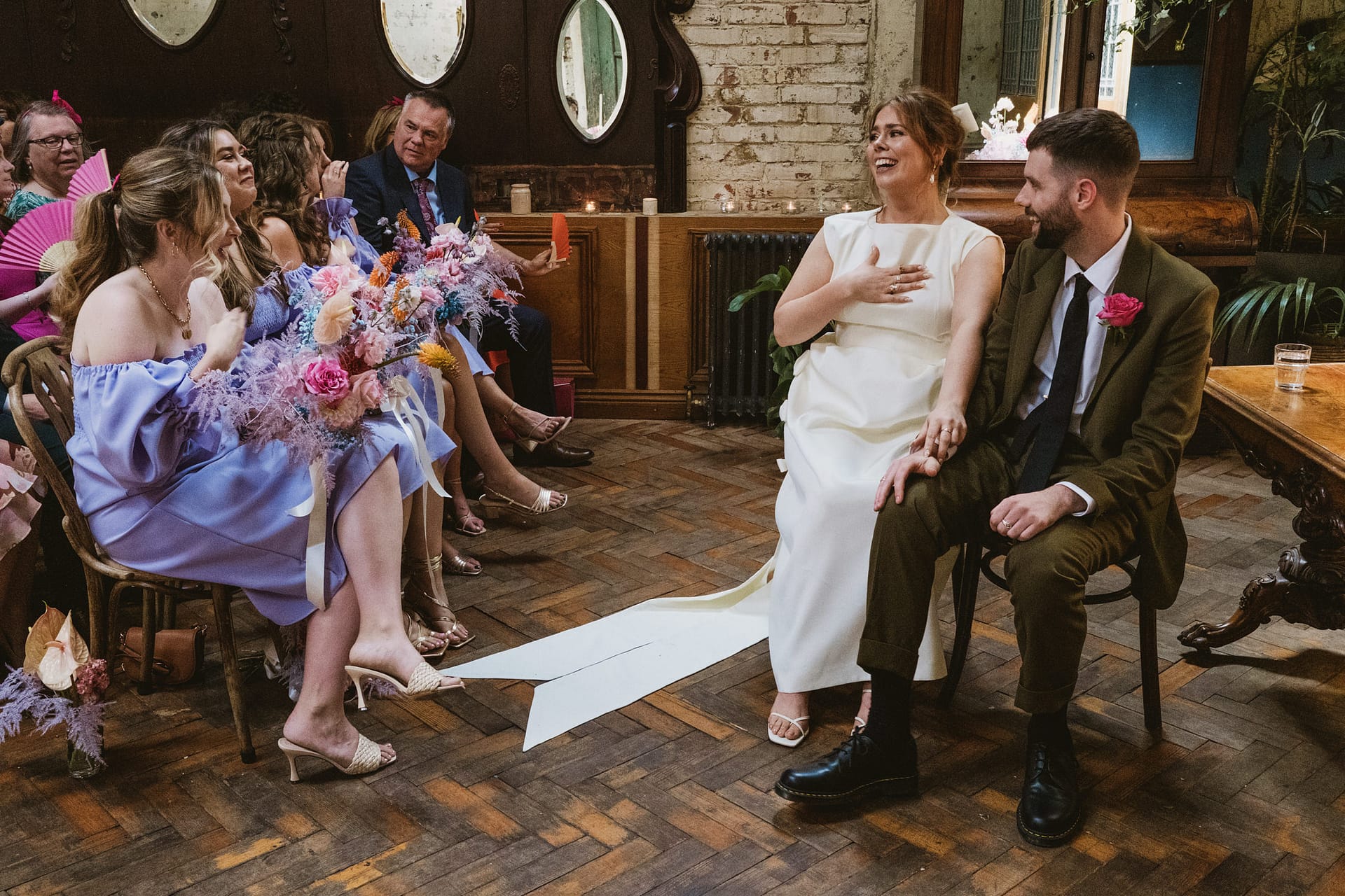 Bride and groom smiling at the Clapton Country Club wedding ceremony.