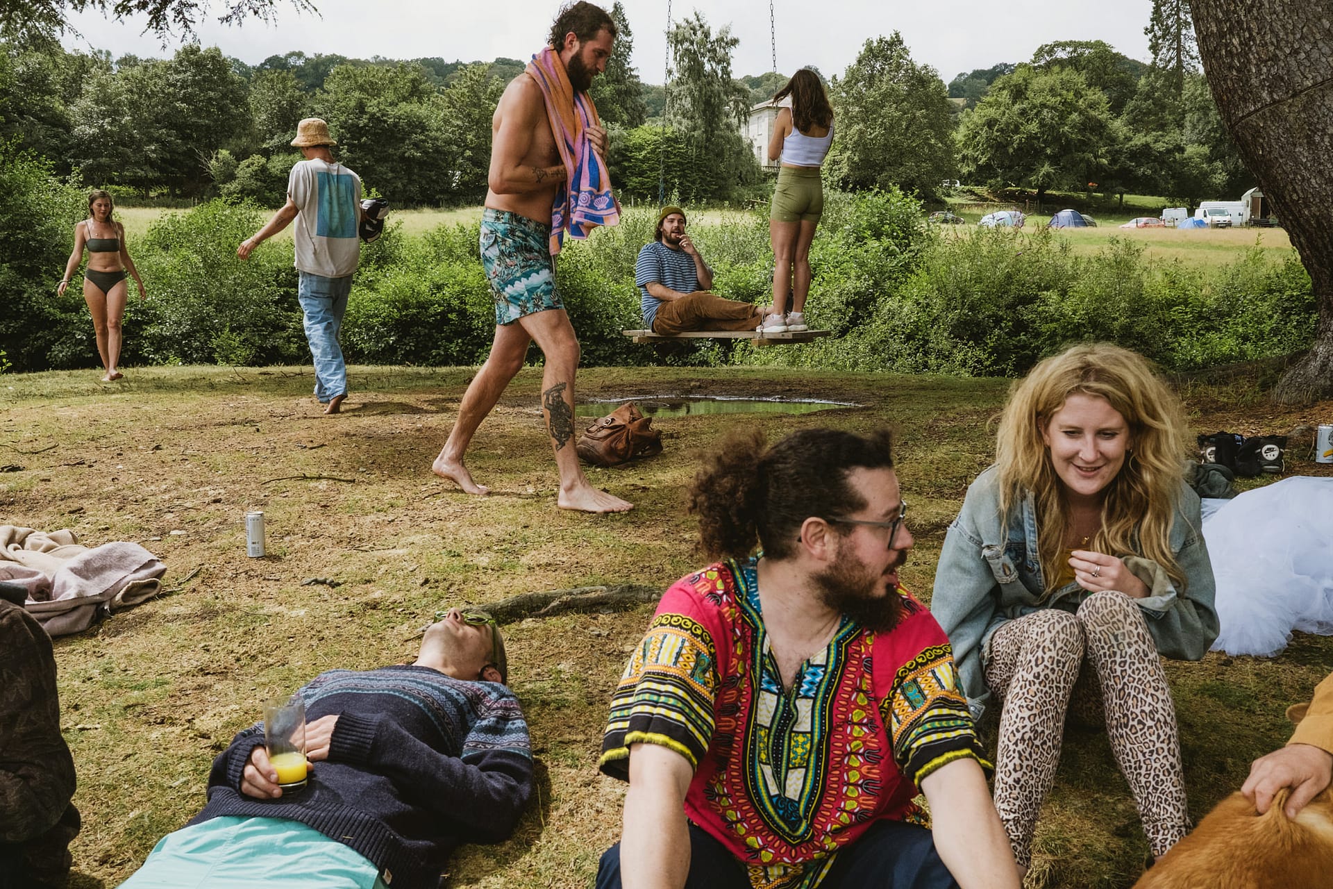 People relaxing and socialising on the Colehayes Park grounds.