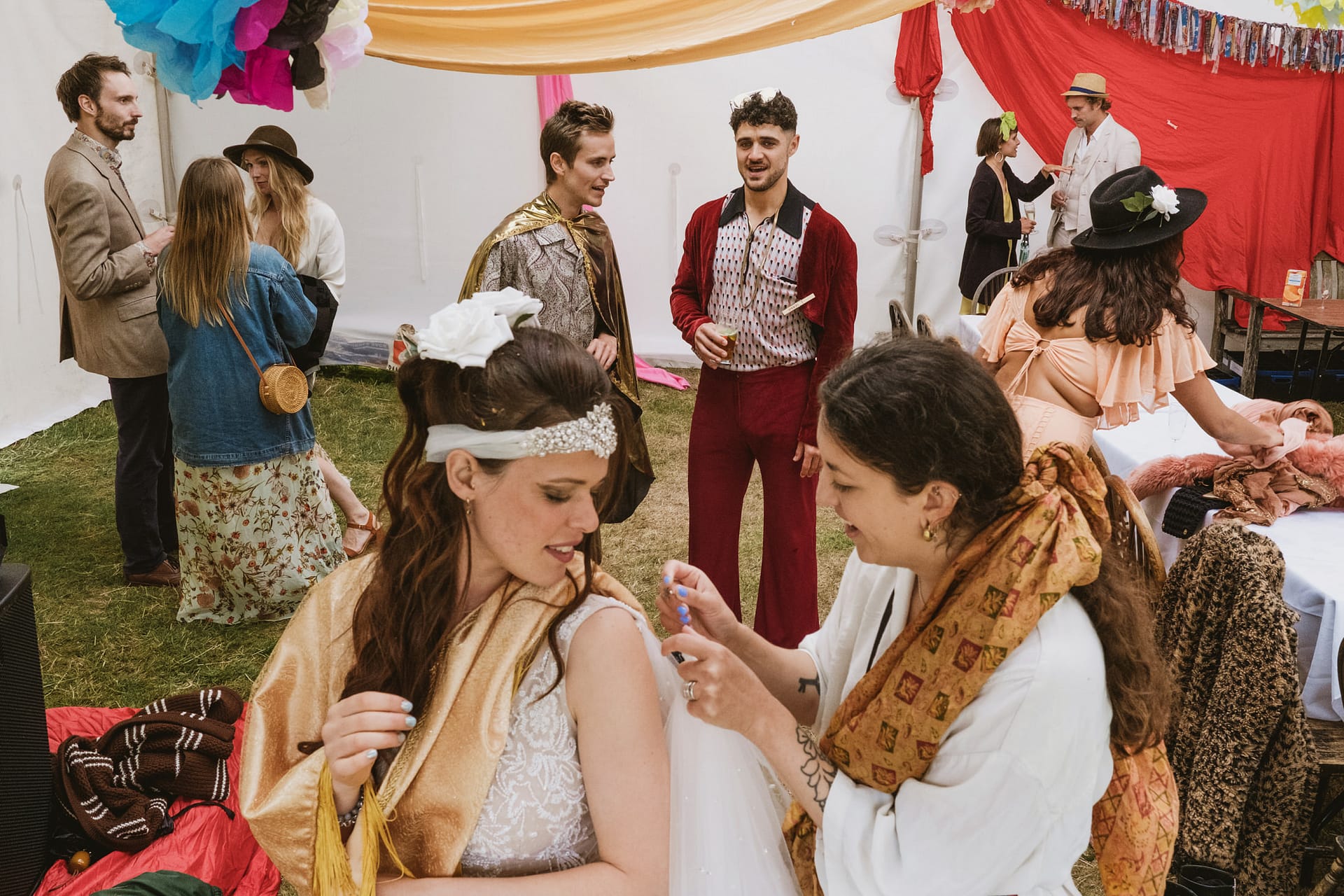 People in vintage costumes at a party.