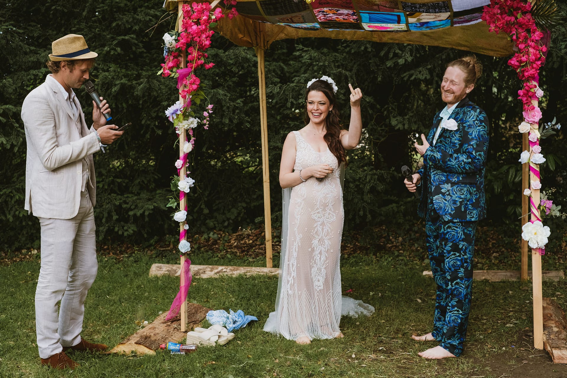Outdoor wedding ceremony with bride, groom and speaker in the Colehayes Park wedding ceremony.